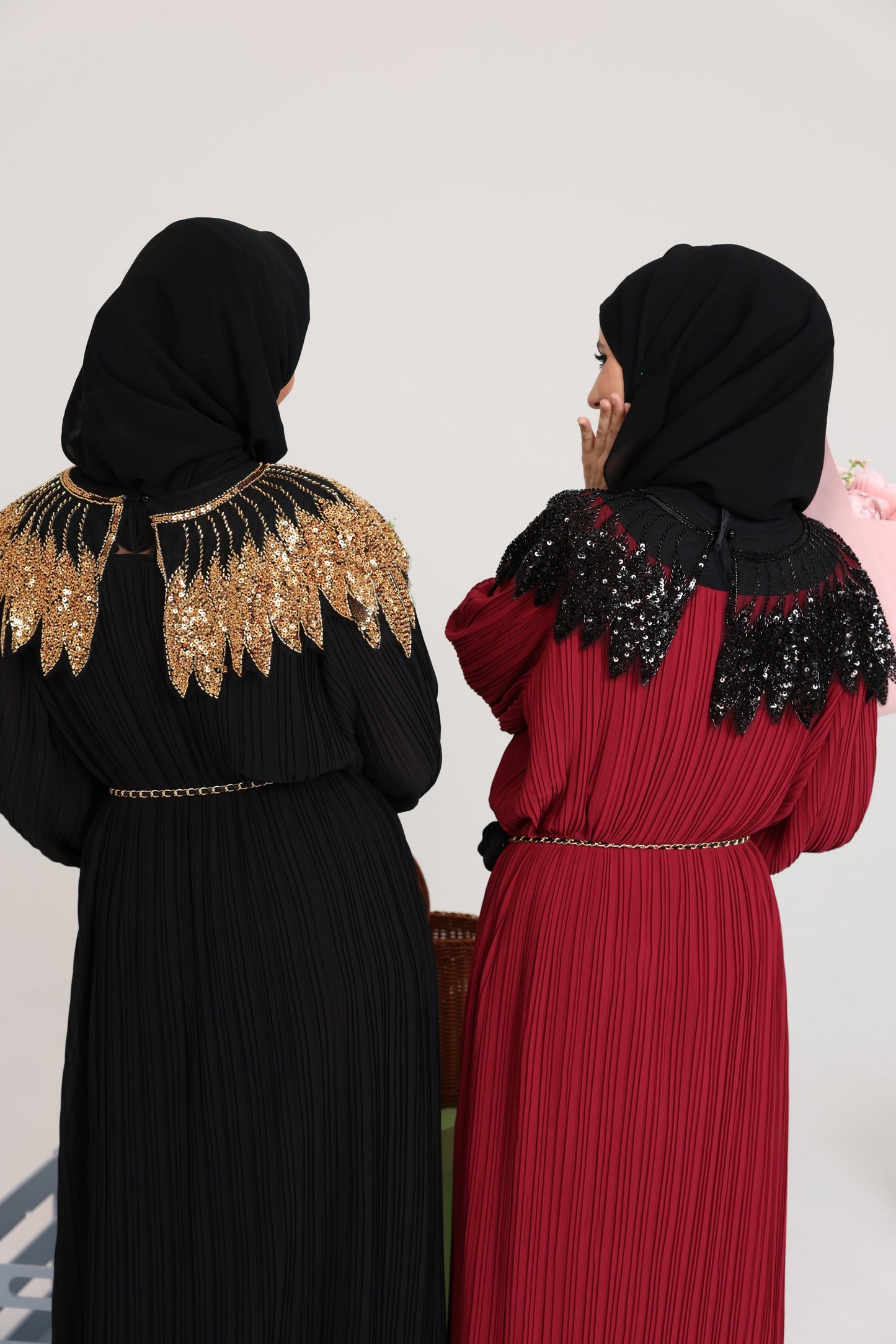Black pleated dress with gold beads