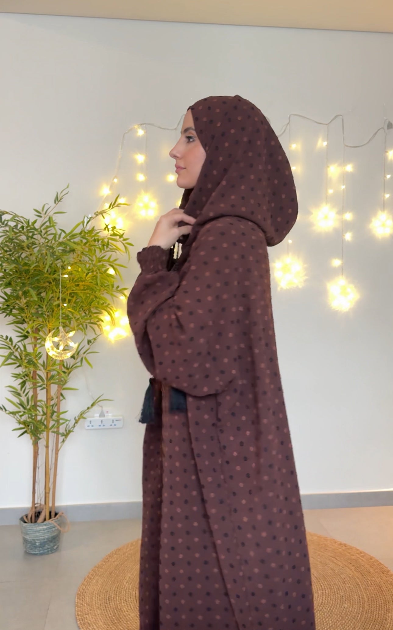 Dark brown burqa with black dots