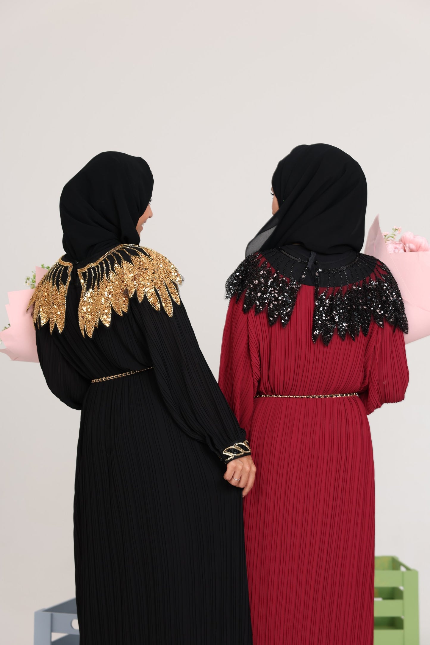 Black pleated dress with gold beads