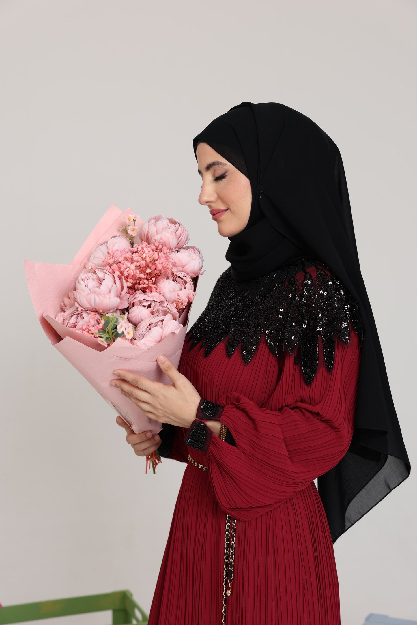 Maroon pleated dress with black beads
