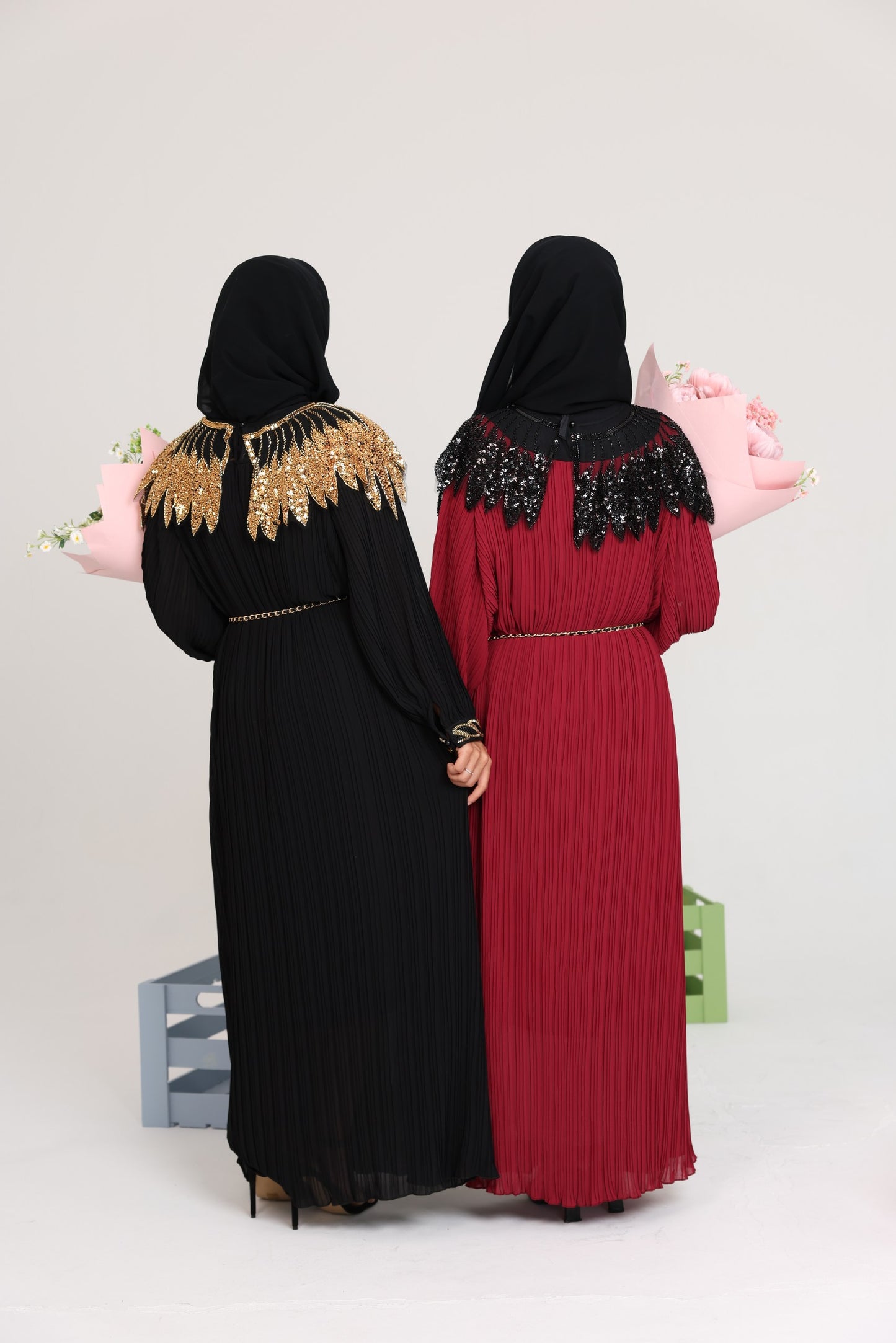 Black pleated dress with gold beads