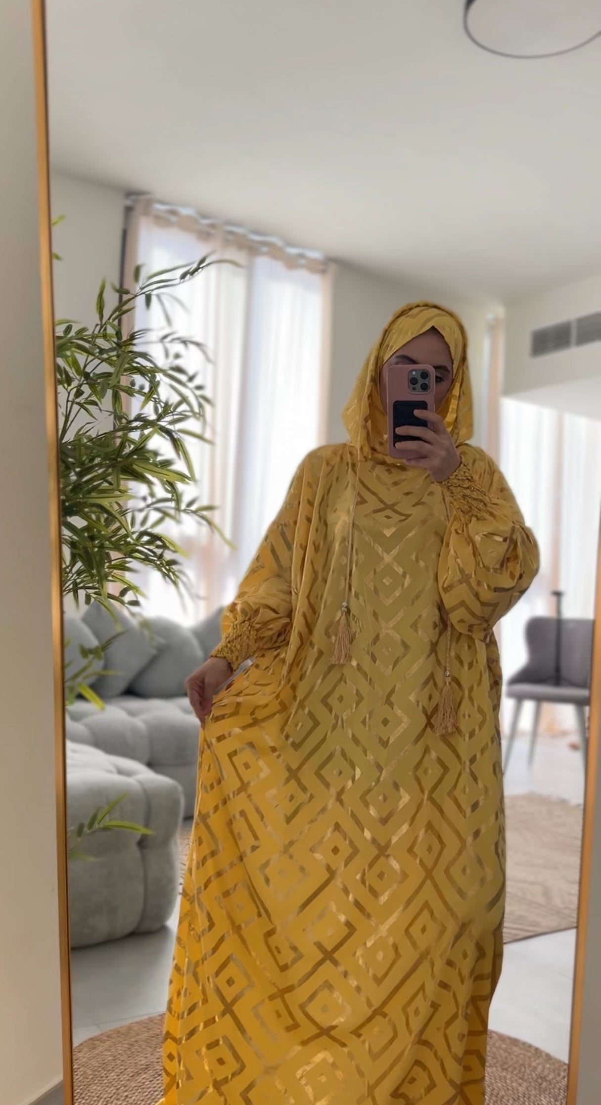 Yellow burqa with gold geometric lines