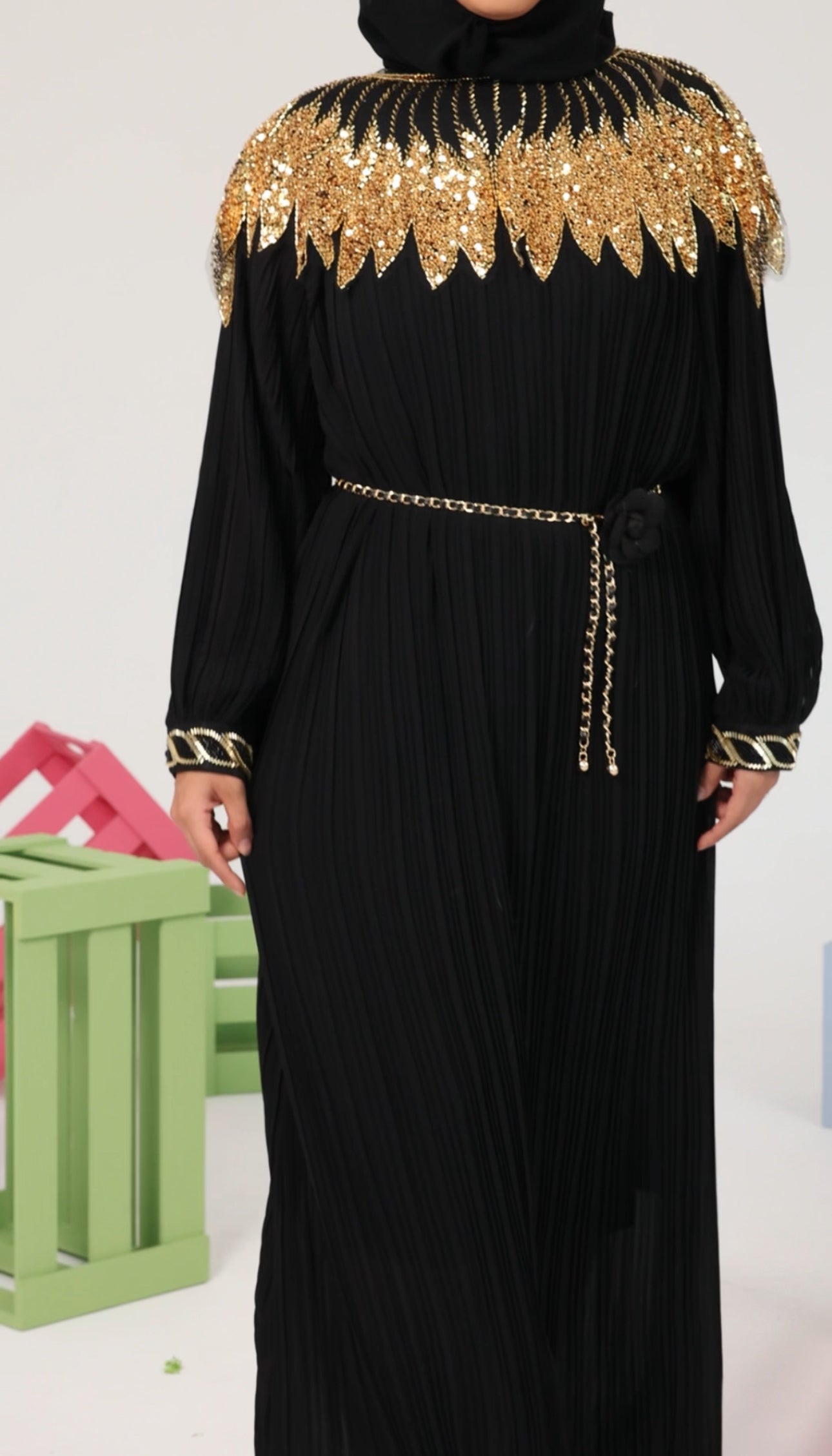 Black pleated dress with gold beads