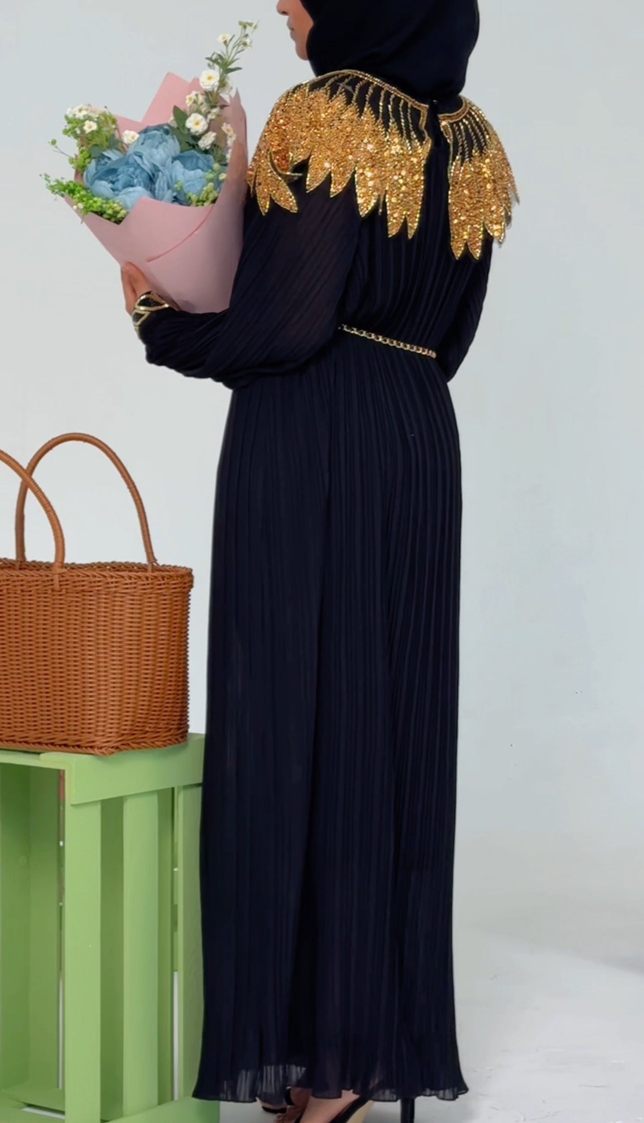 Black pleated dress with gold beads