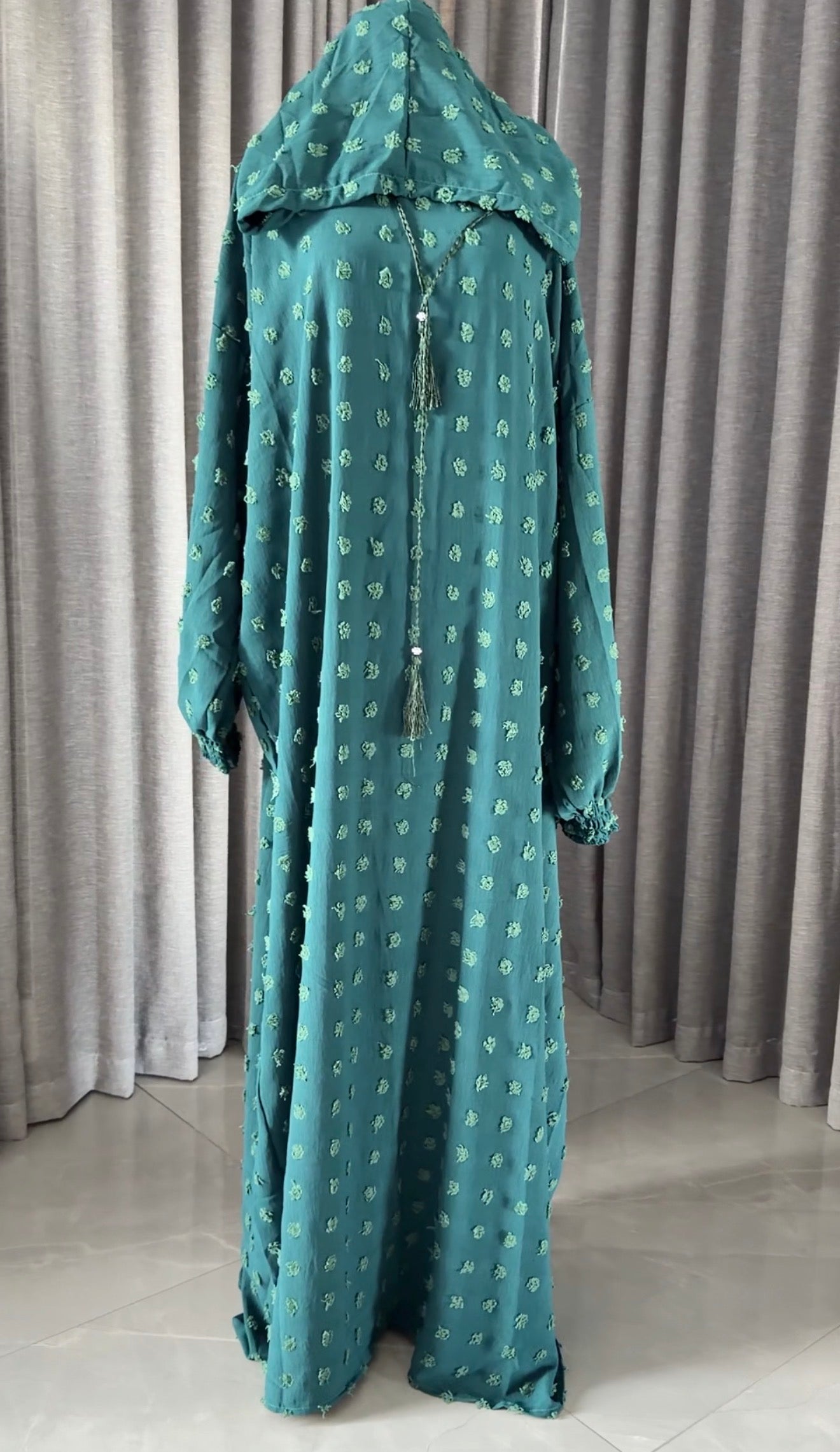 Dark green burqa with big dots