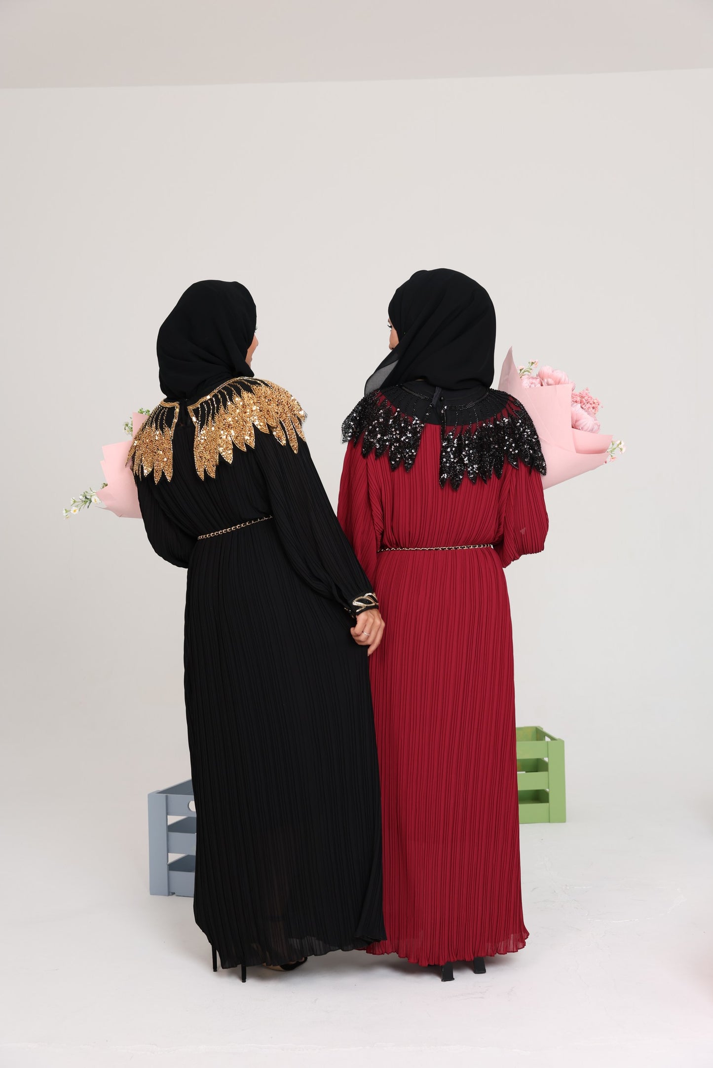 Black pleated dress with gold beads