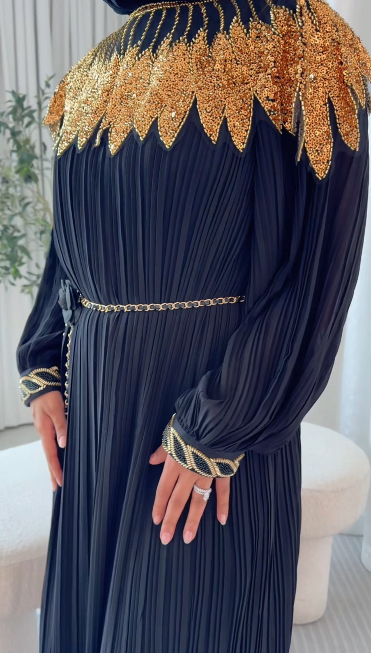 Black pleated dress with gold beads