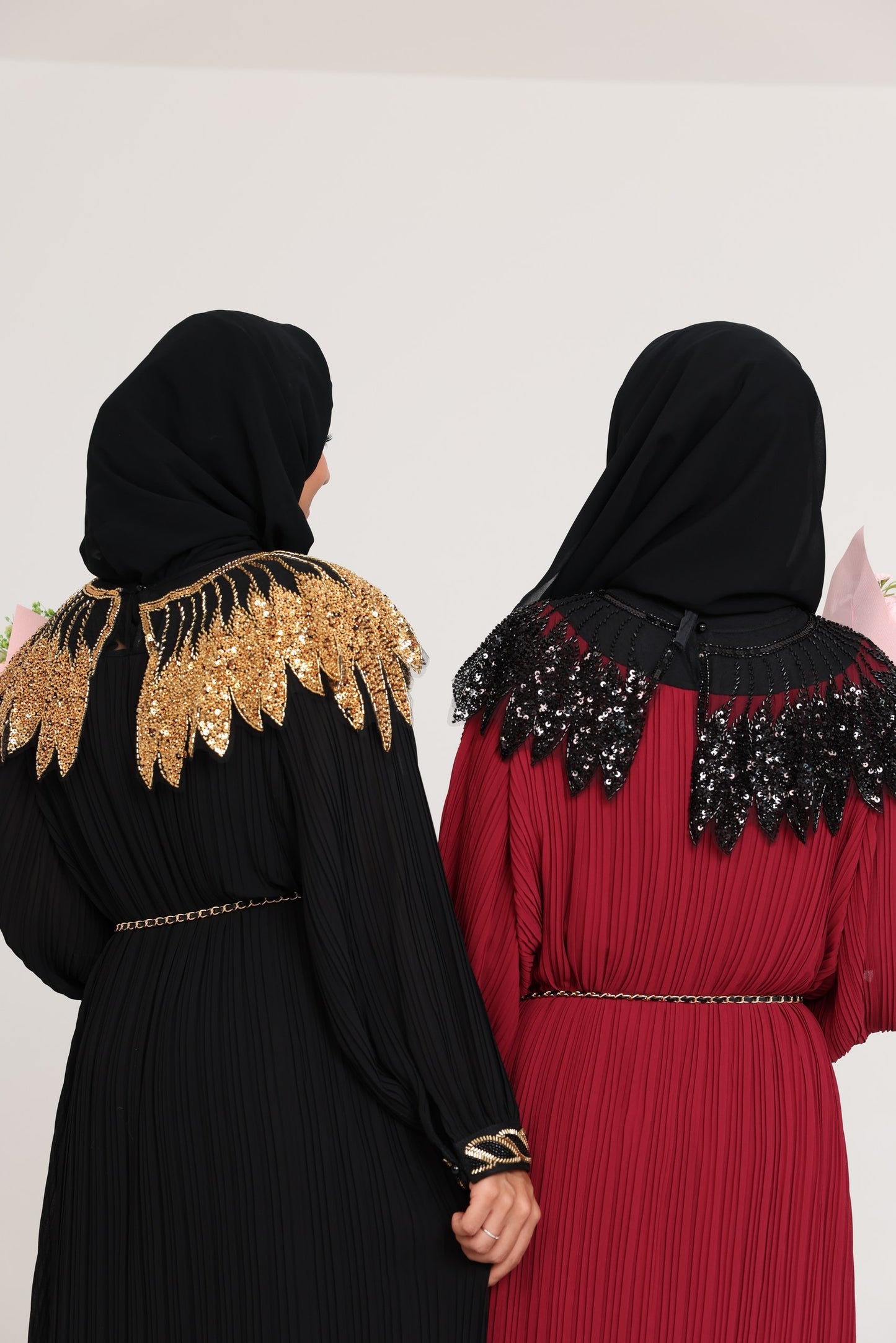 Black pleated dress with gold beads