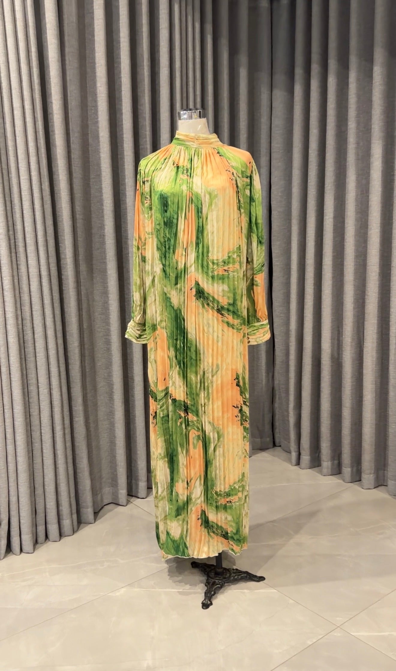 Green and yellow pleated dress