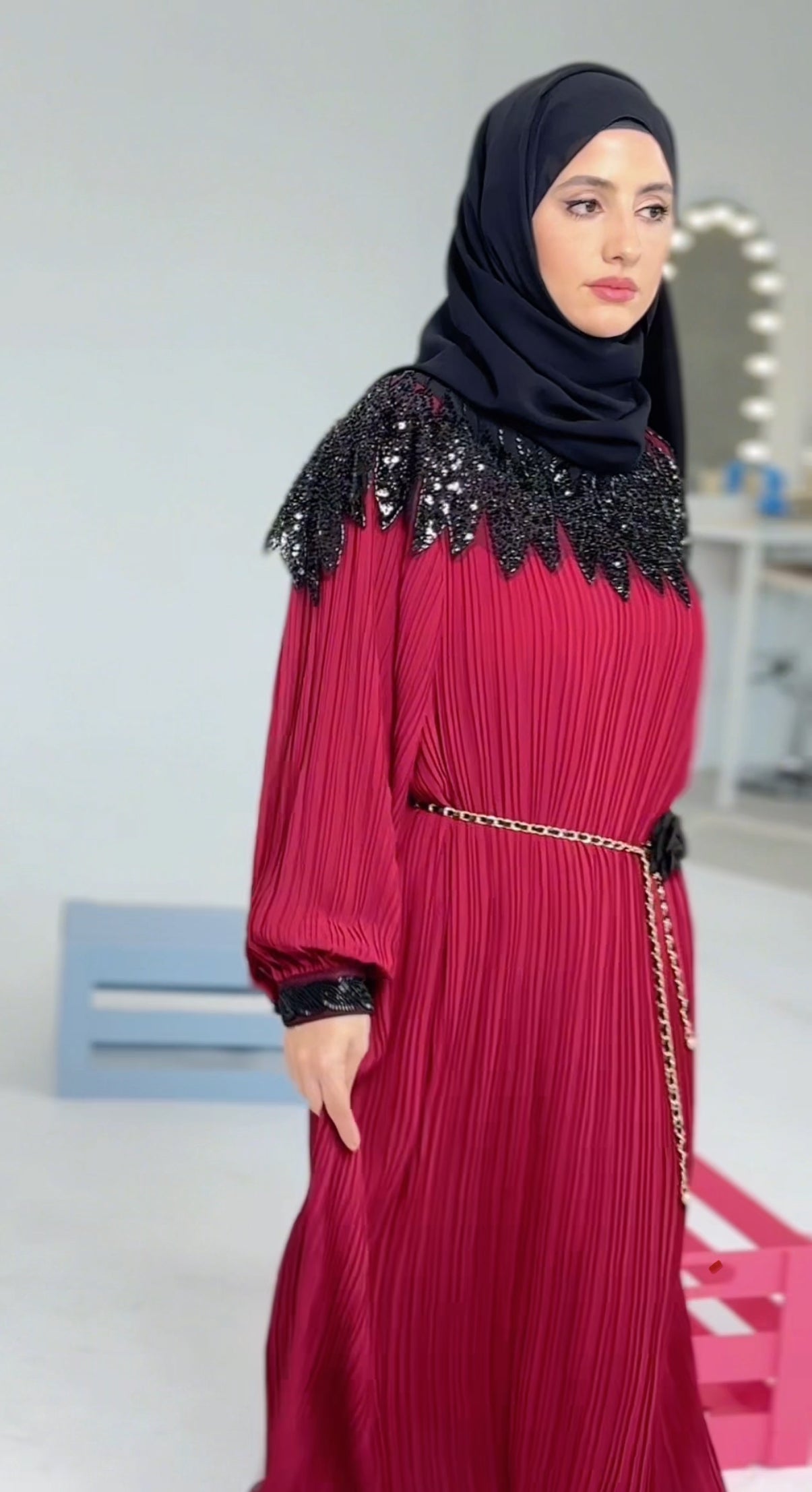 Maroon pleated dress with black beads