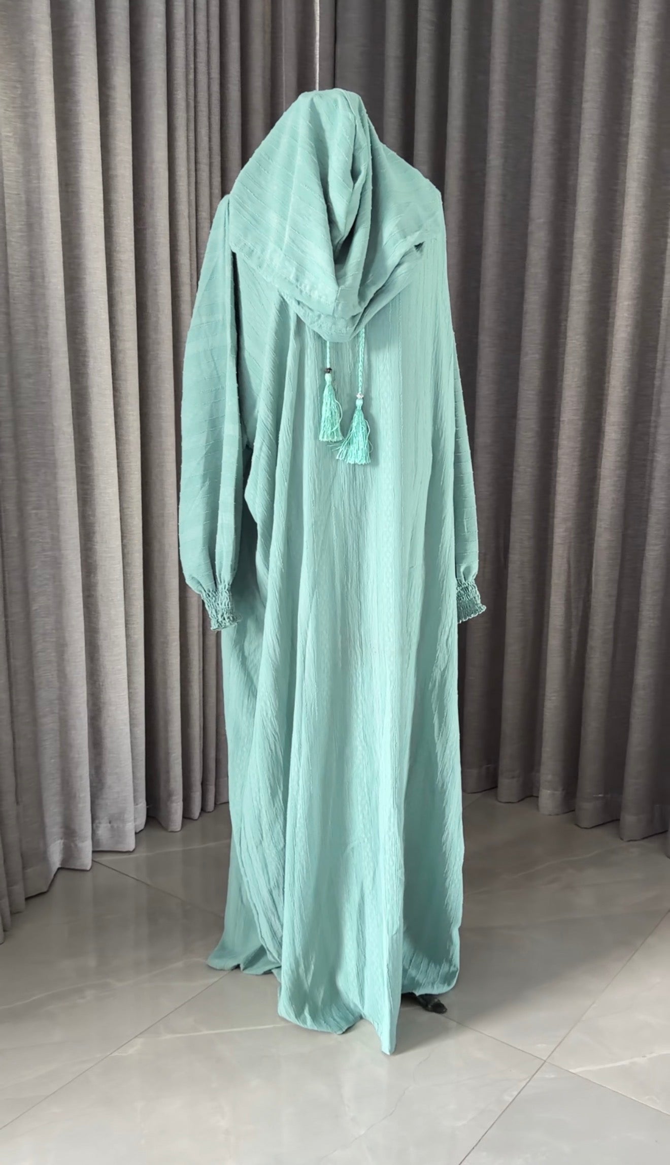 Light blue burqa with vertical lines