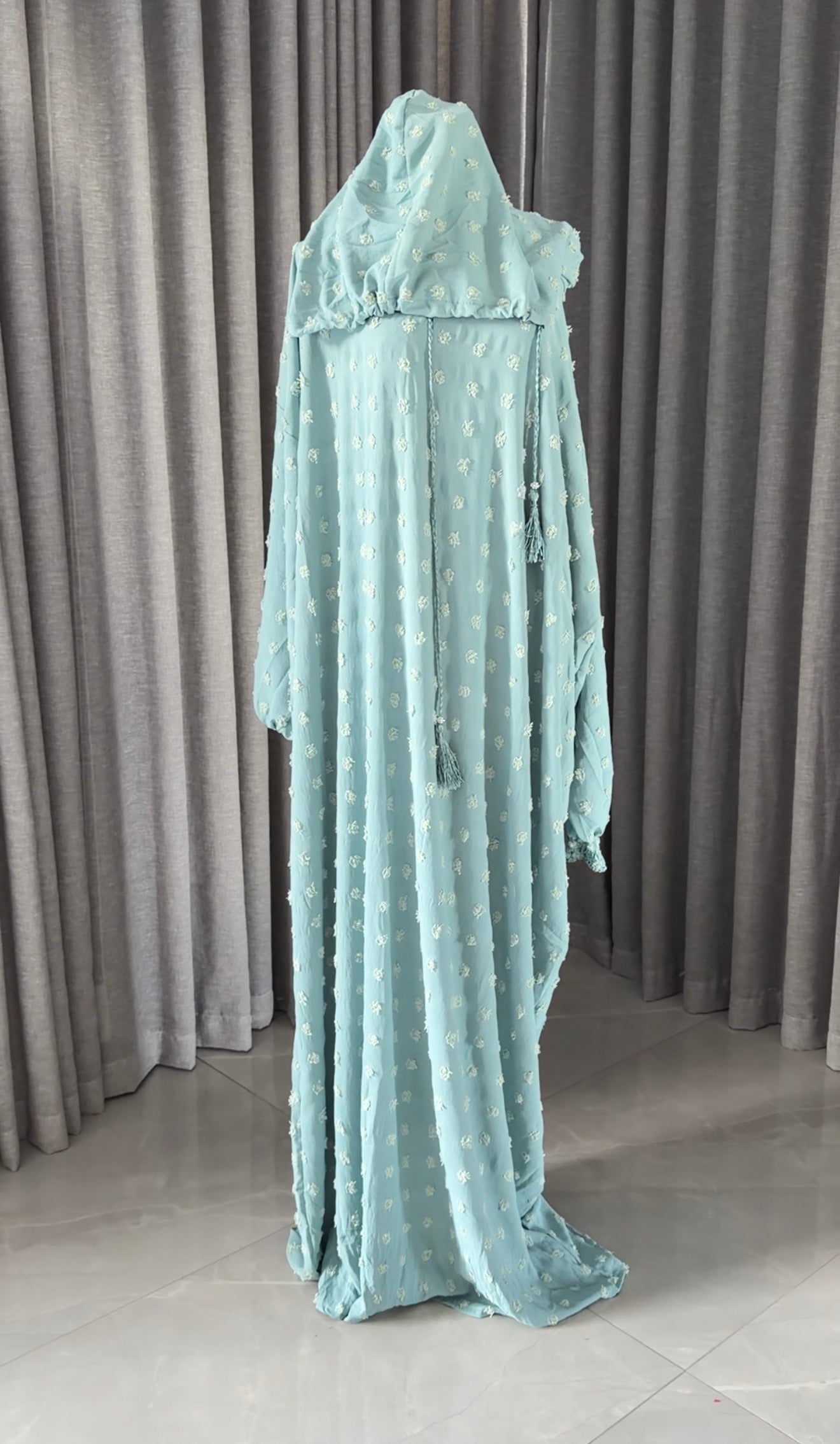 Light blue burqa with big dots