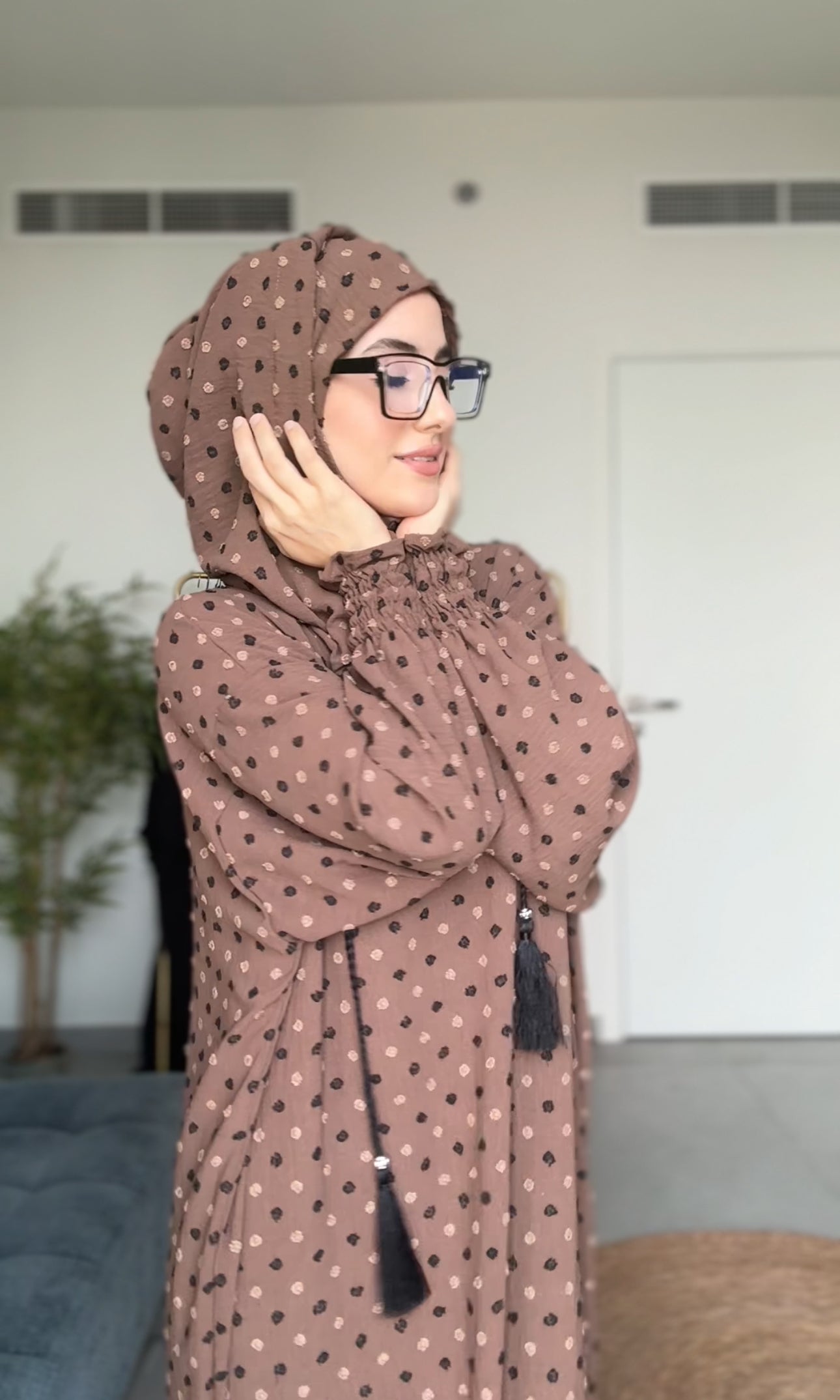 Brown burqa with black dots