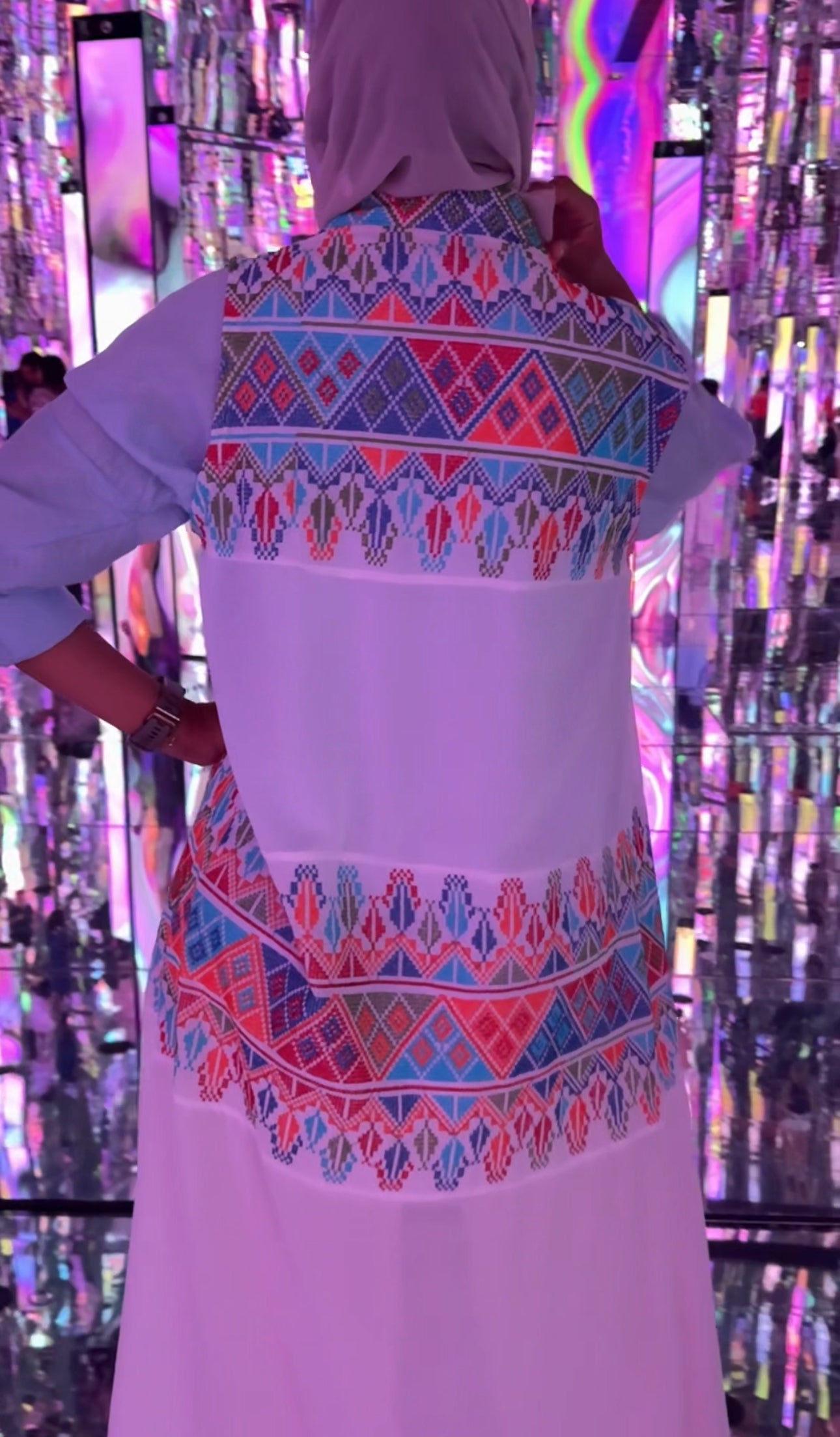 White Palestinian Tatreez throw with half sleeves and colorful embroidery