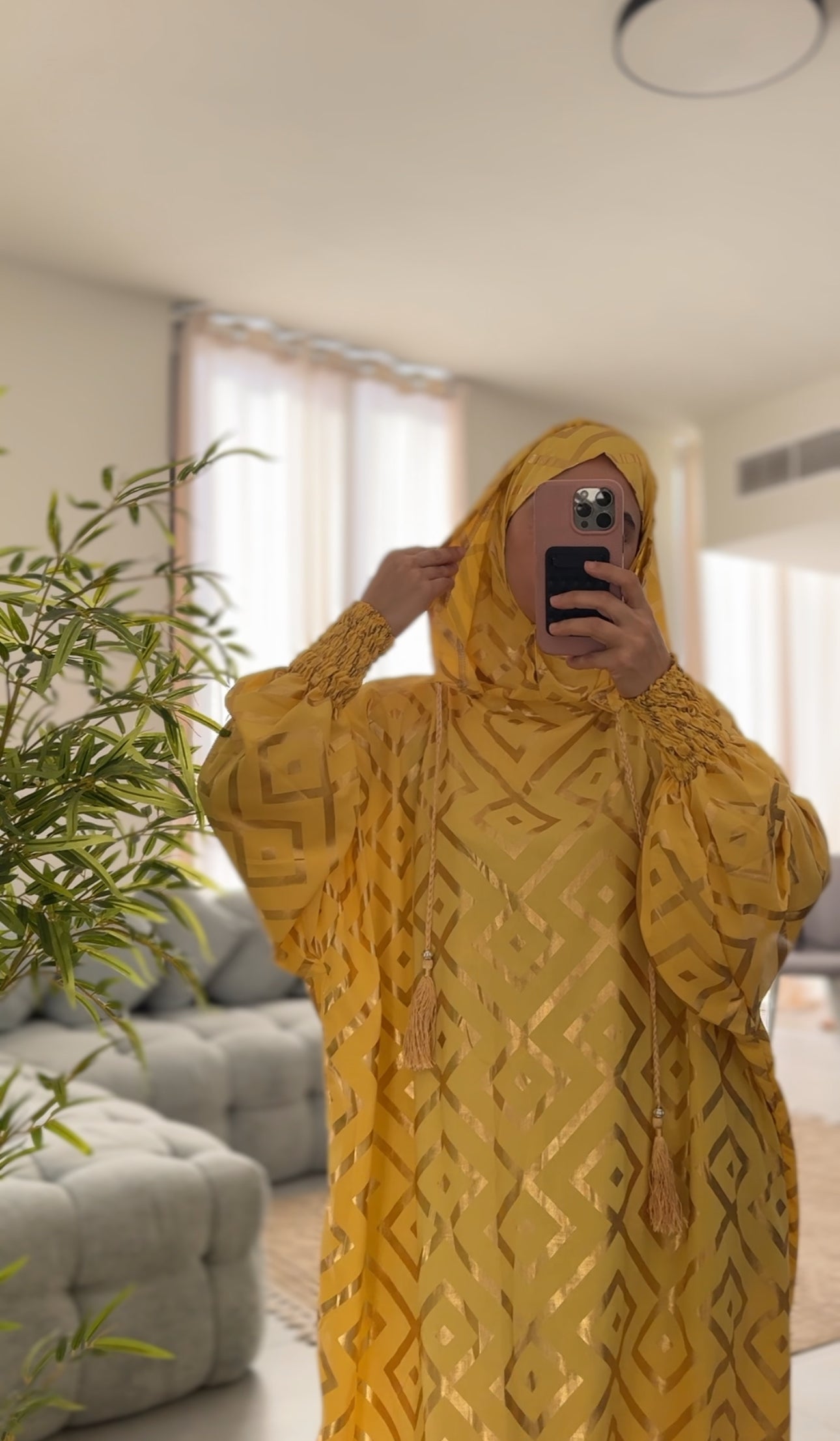 Yellow burqa with gold geometric lines