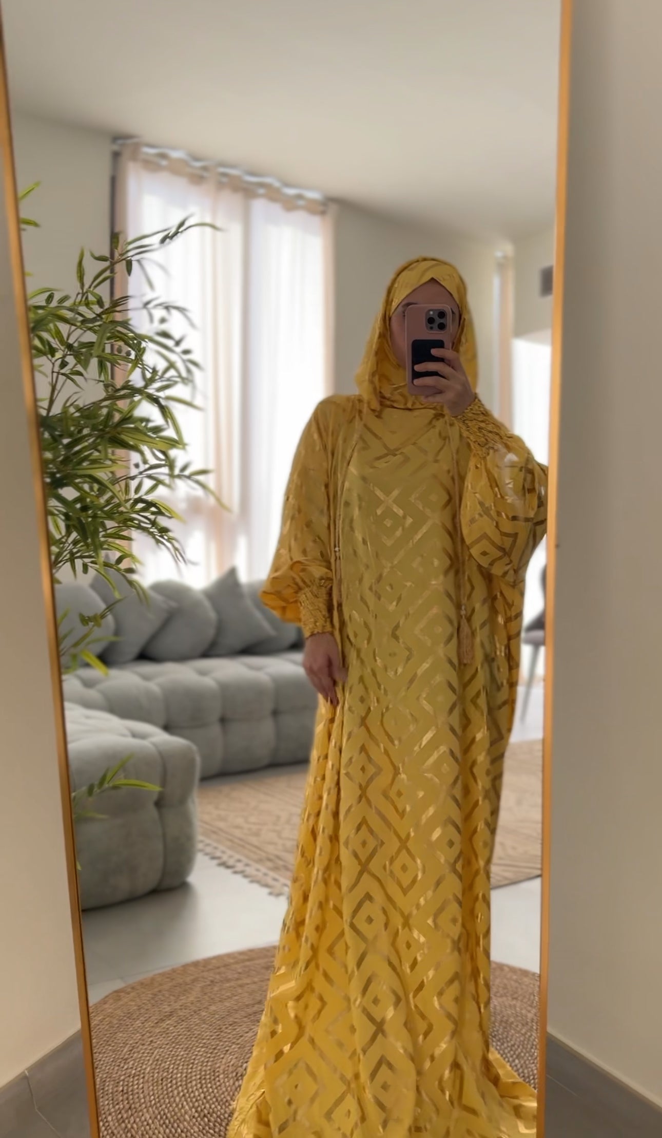 Yellow burqa with gold geometric lines