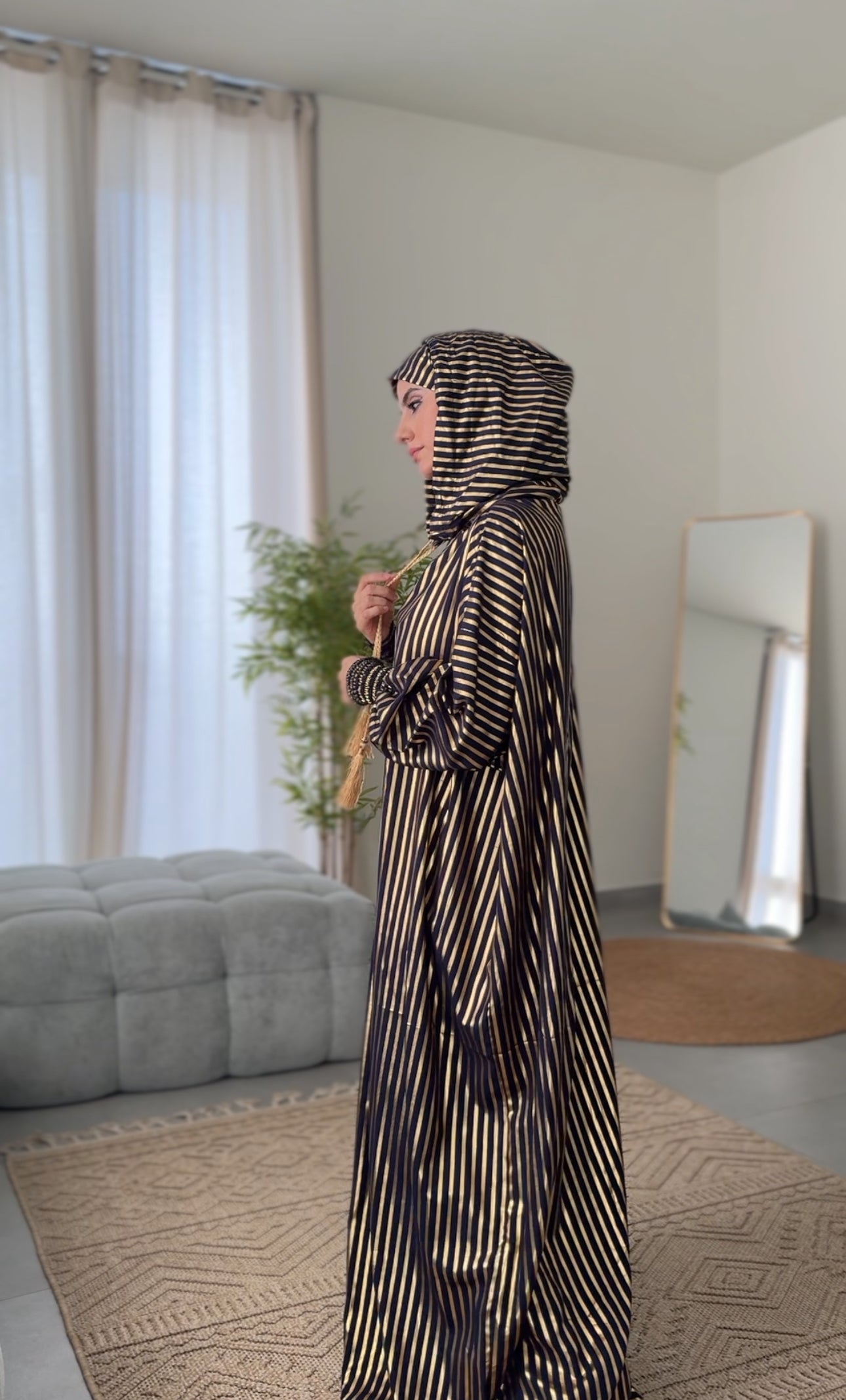 Dark navy burqa with thick gold vertical lines