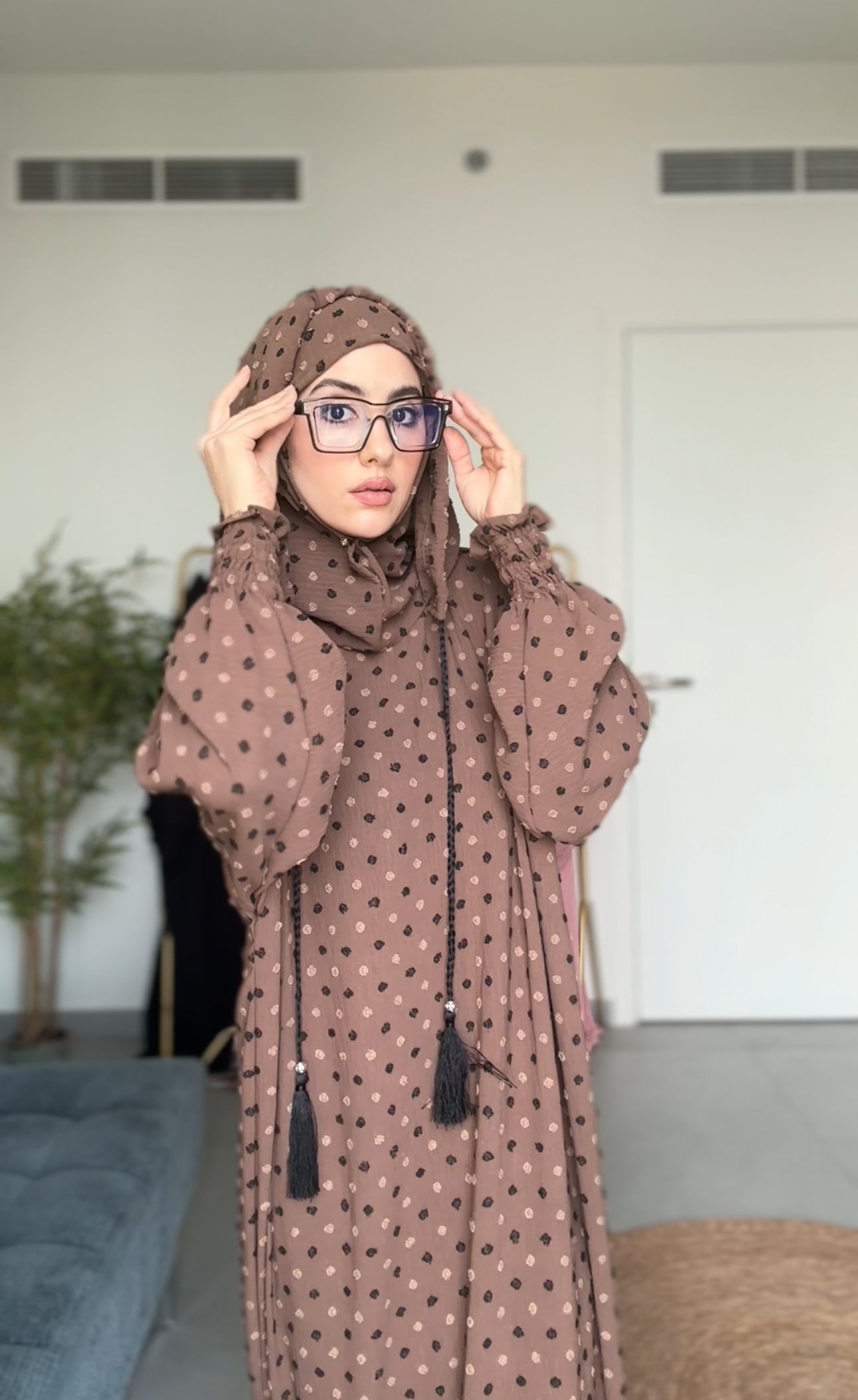 Brown burqa with black dots