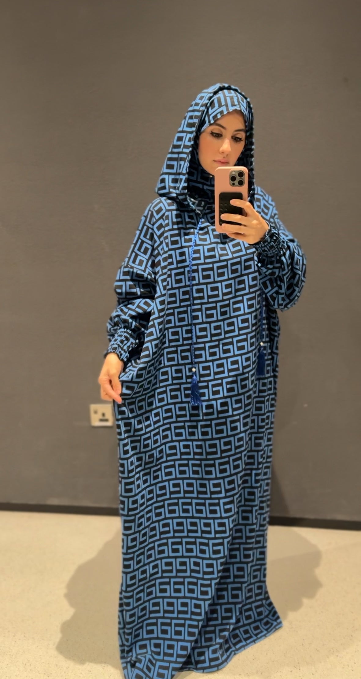 Blue burqa with black geometric lines