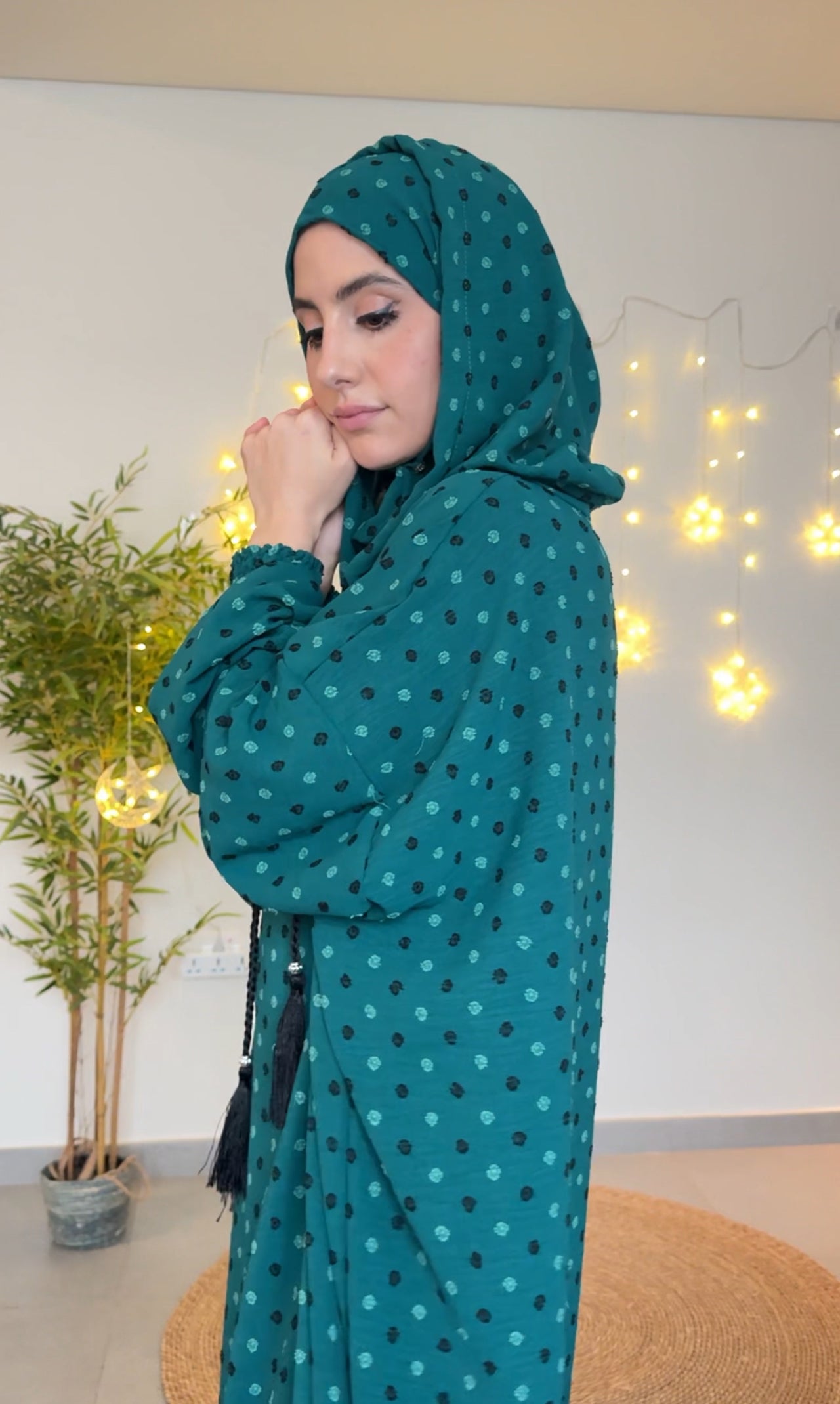 Emerald green burqa with black dots