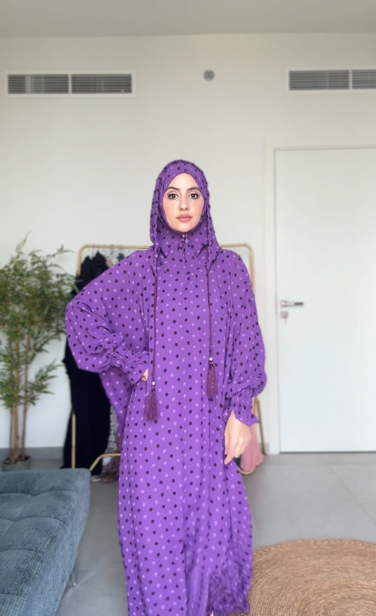 Bright purple burqa with black dots