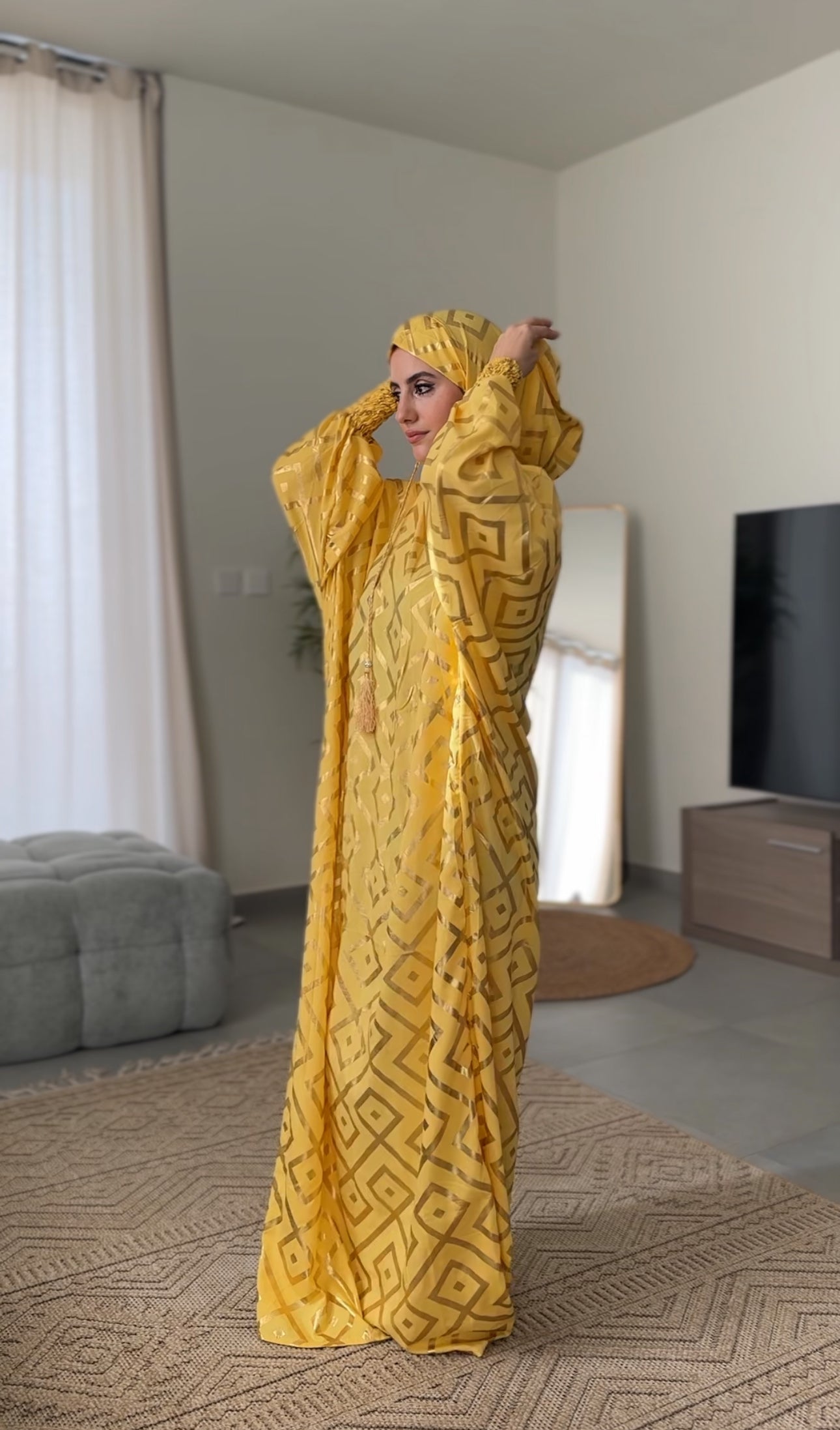 Yellow burqa with gold geometric lines