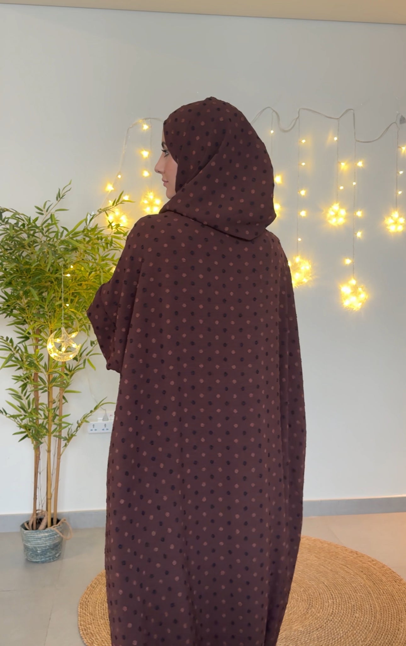 Dark brown burqa with black dots