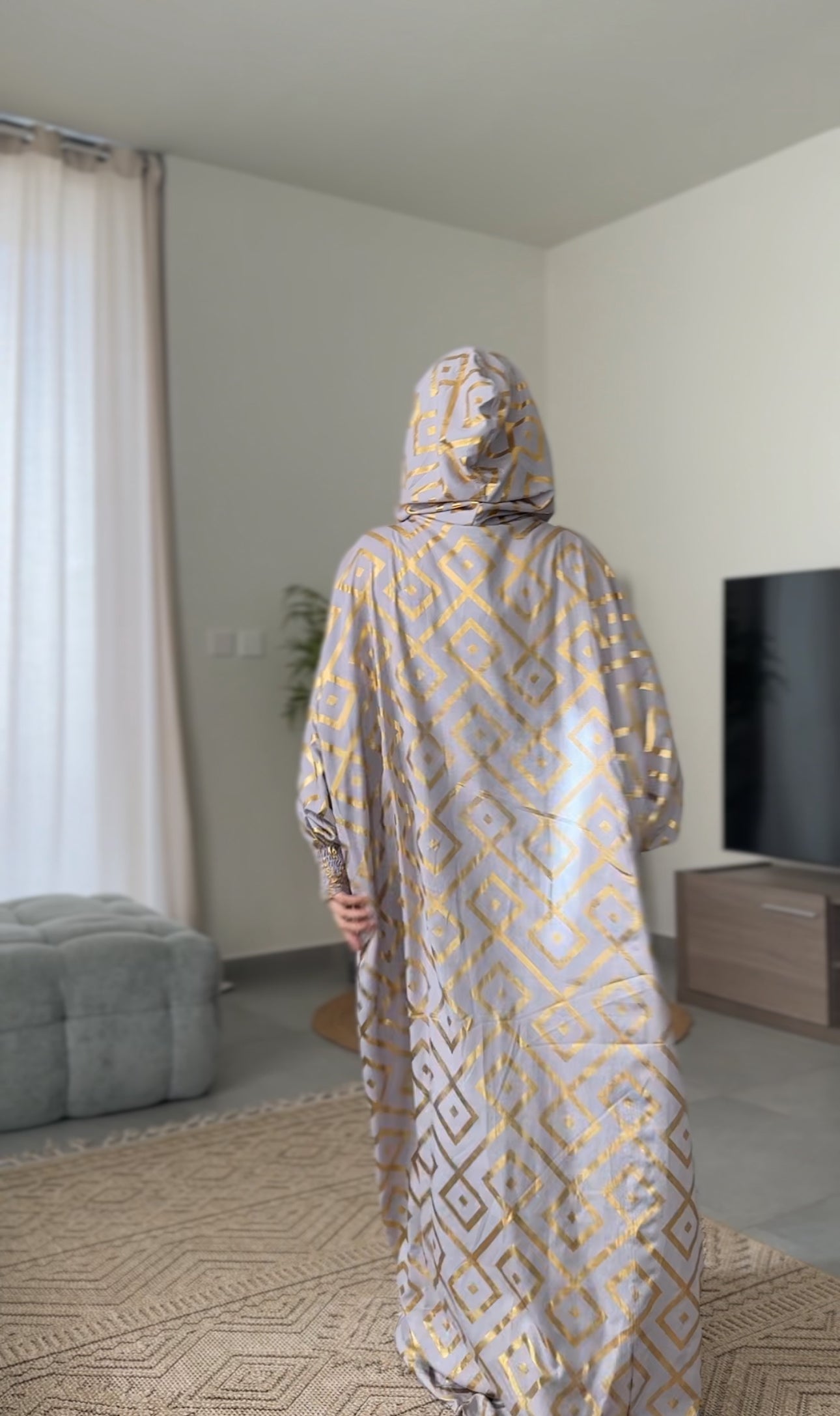 Light grey burqa with gold geometric lines