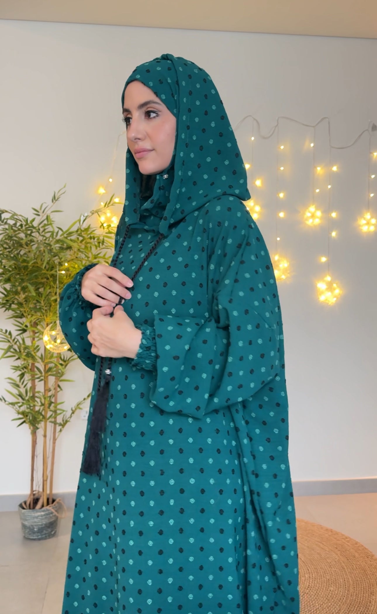 Emerald green burqa with black dots