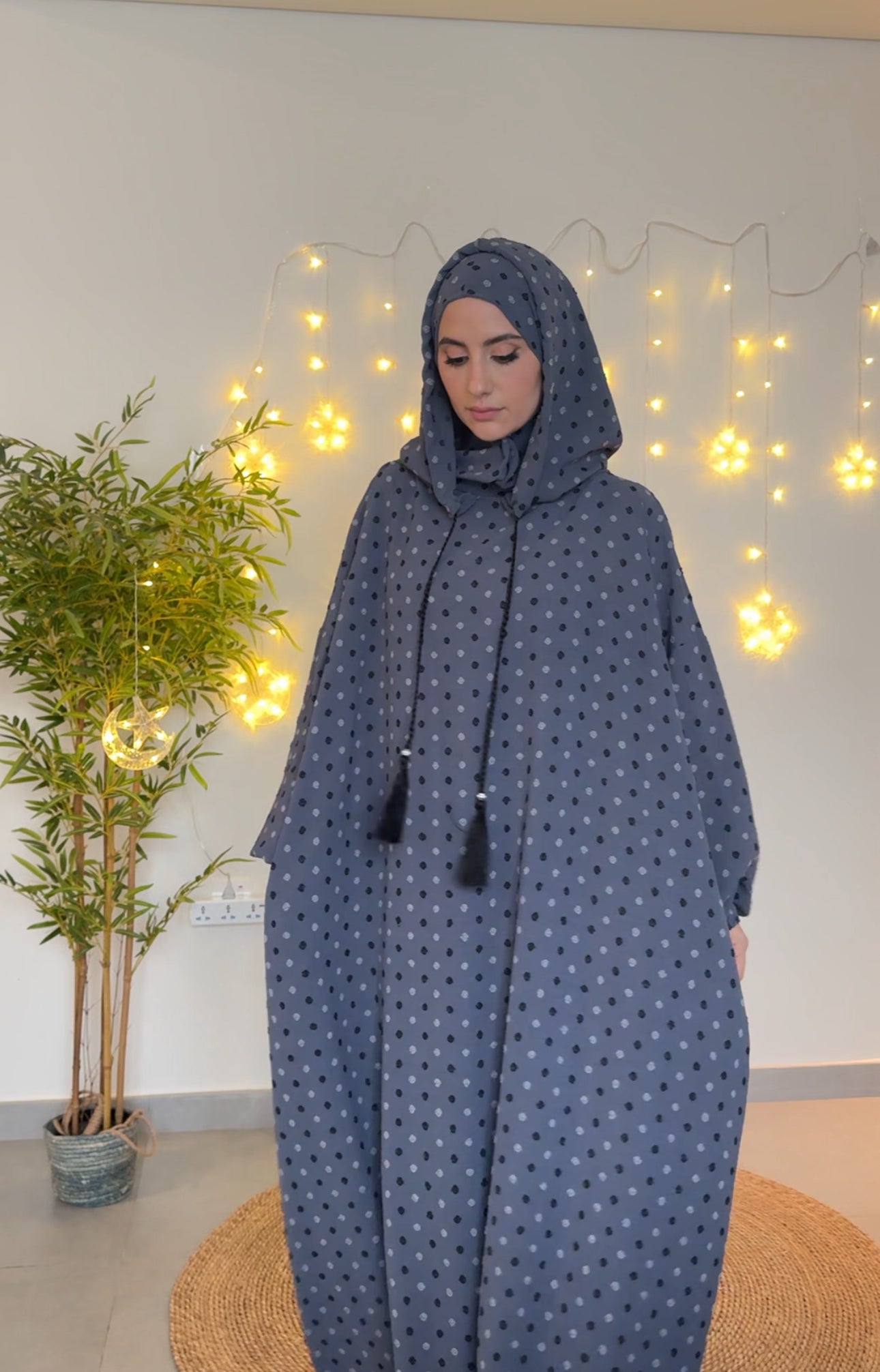 Gray burqa with black dots