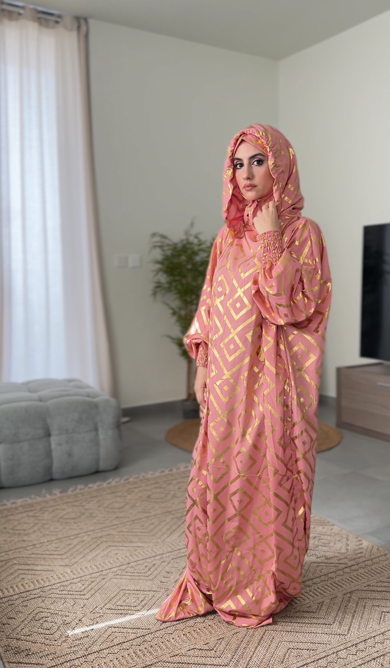 Light coral burqa with gold geometric lines