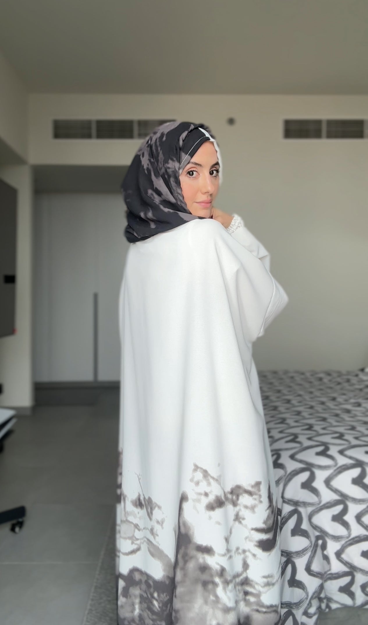 White burqa with gray dye