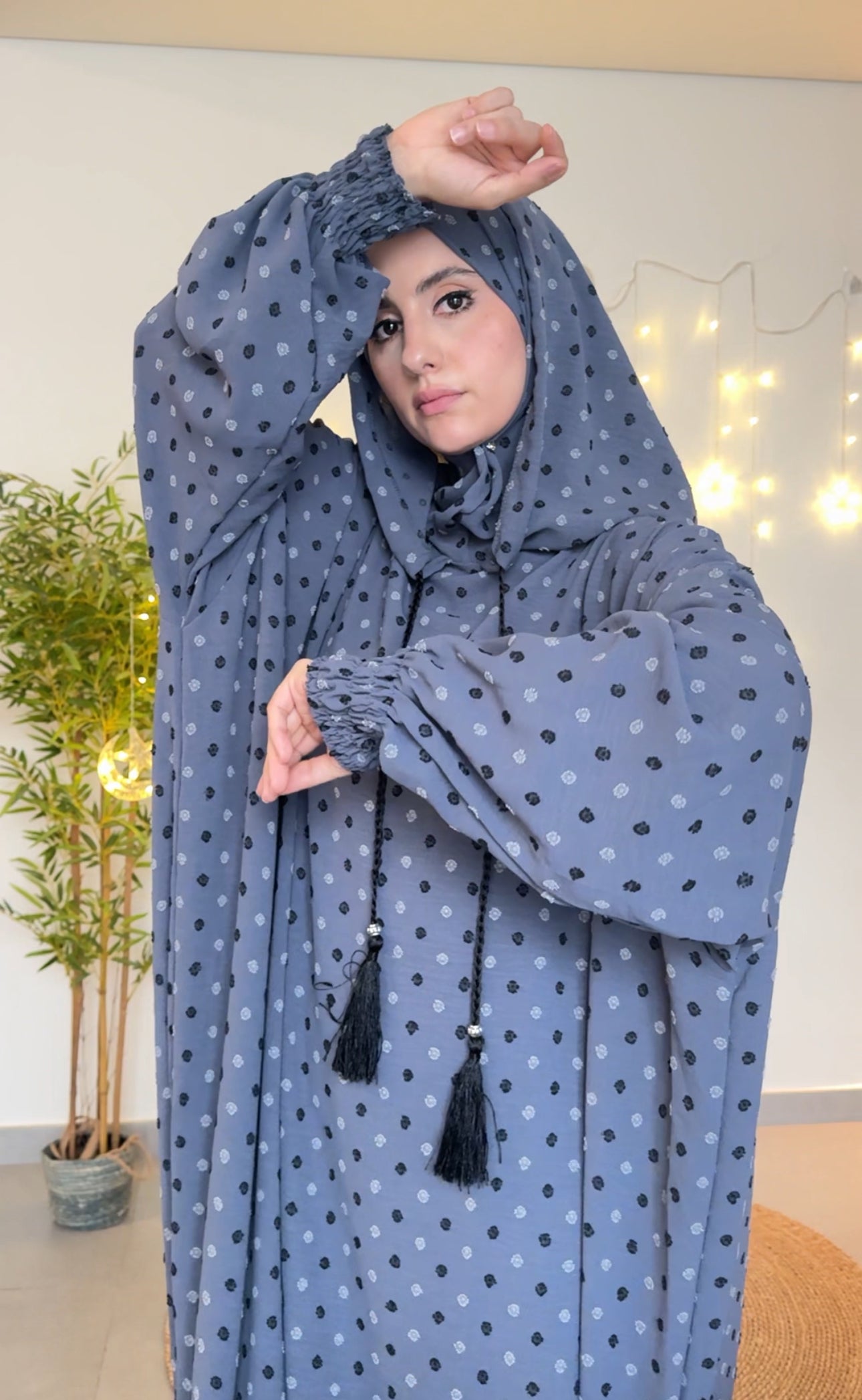 Gray burqa with black dots