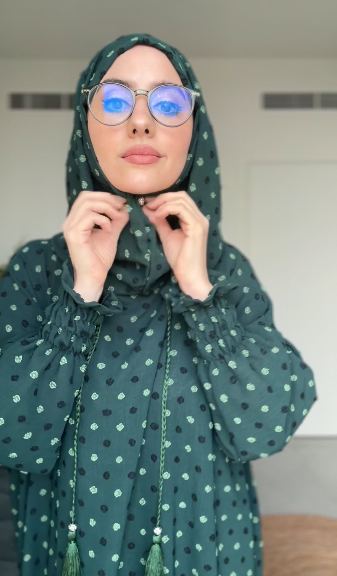 Emerald green burqa with black dots