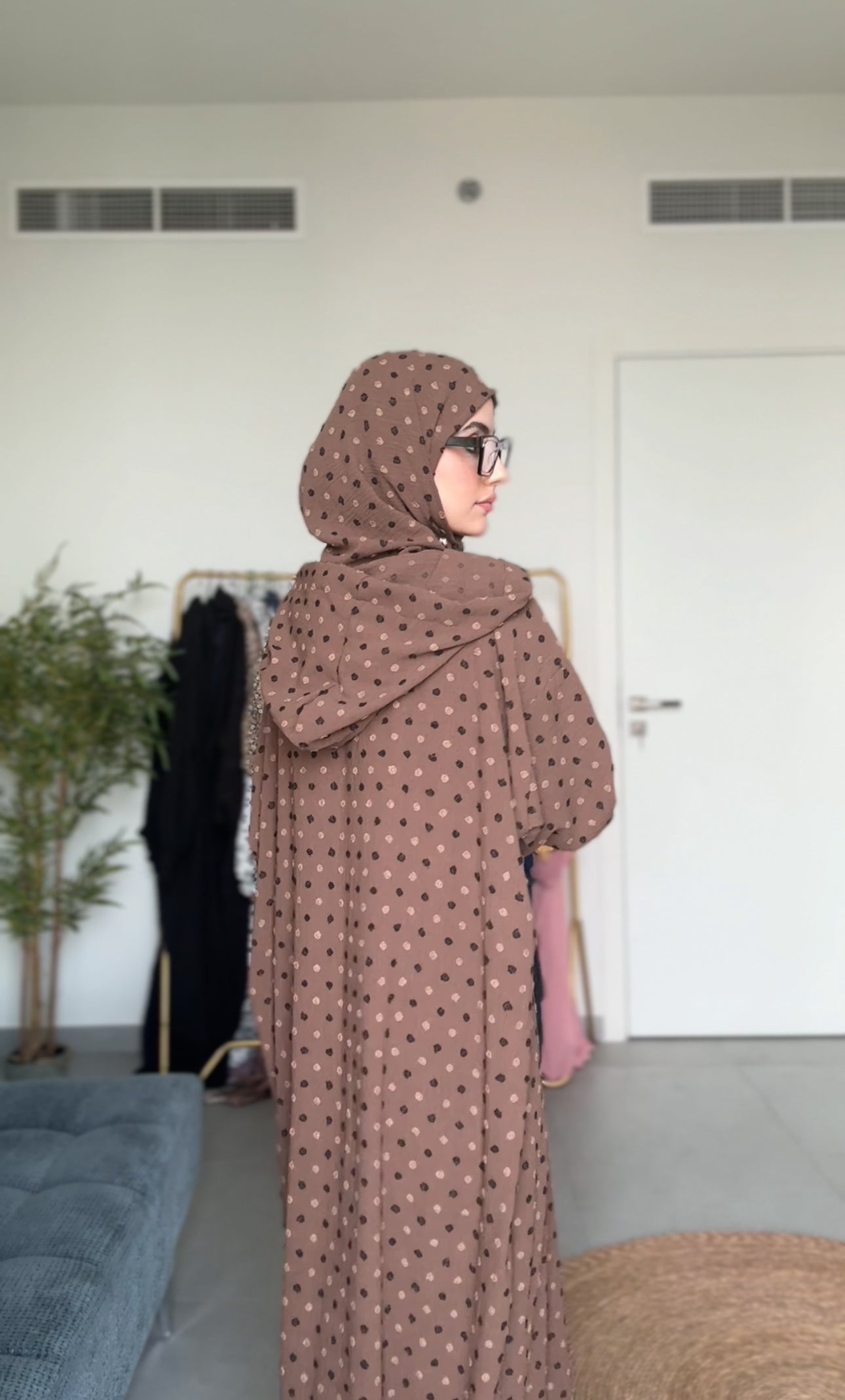 Brown burqa with black dots