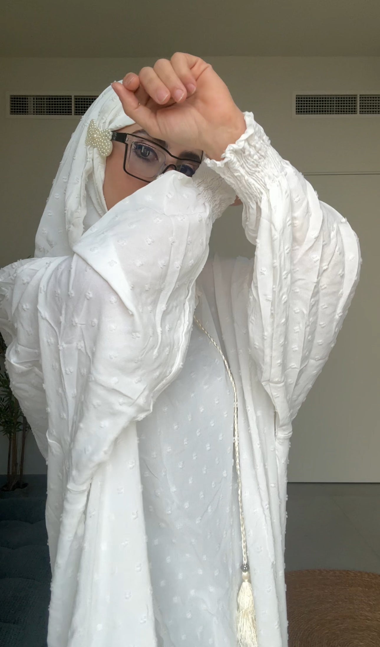 White burqa with white dots