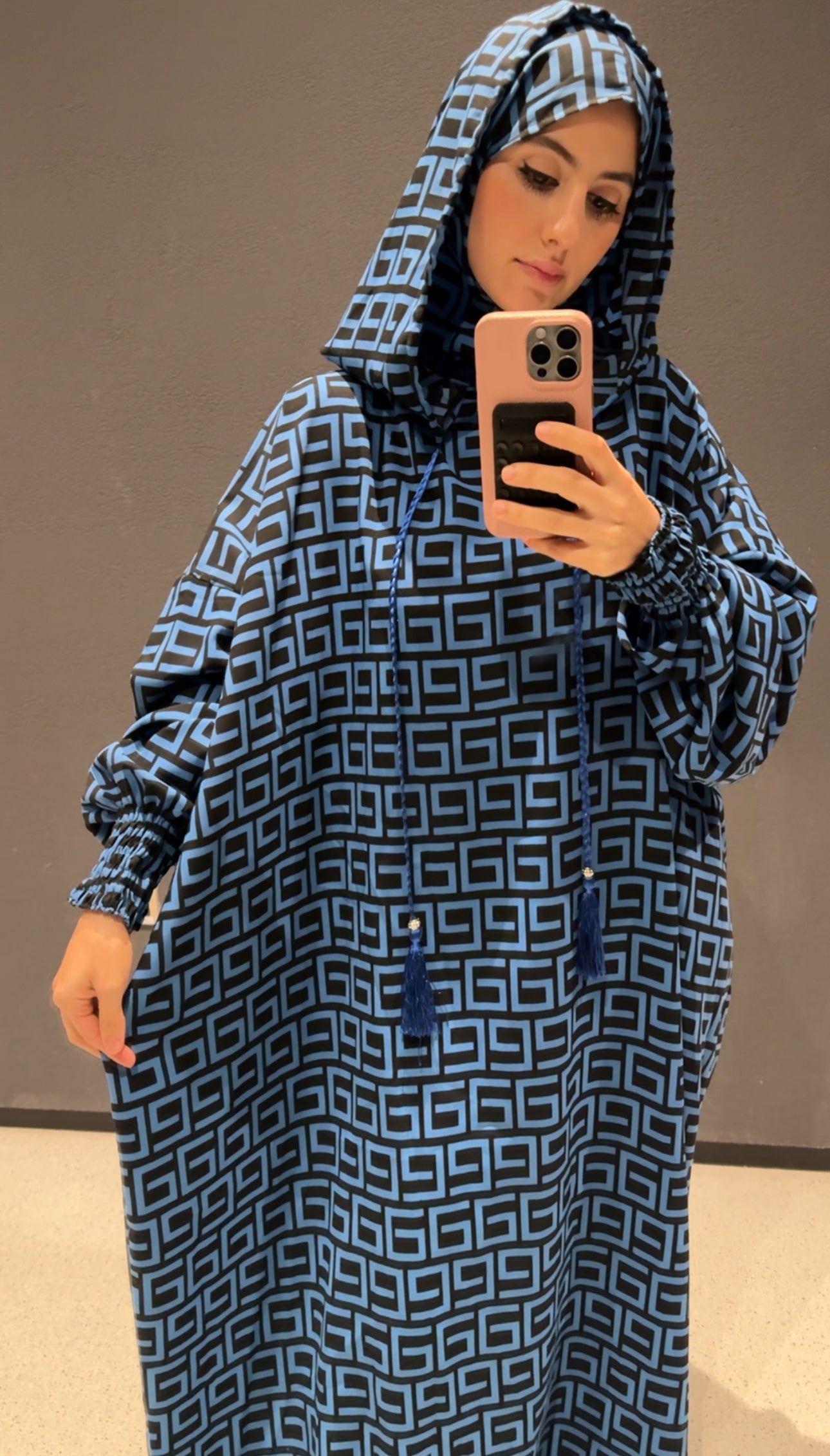 Blue burqa with black geometric lines