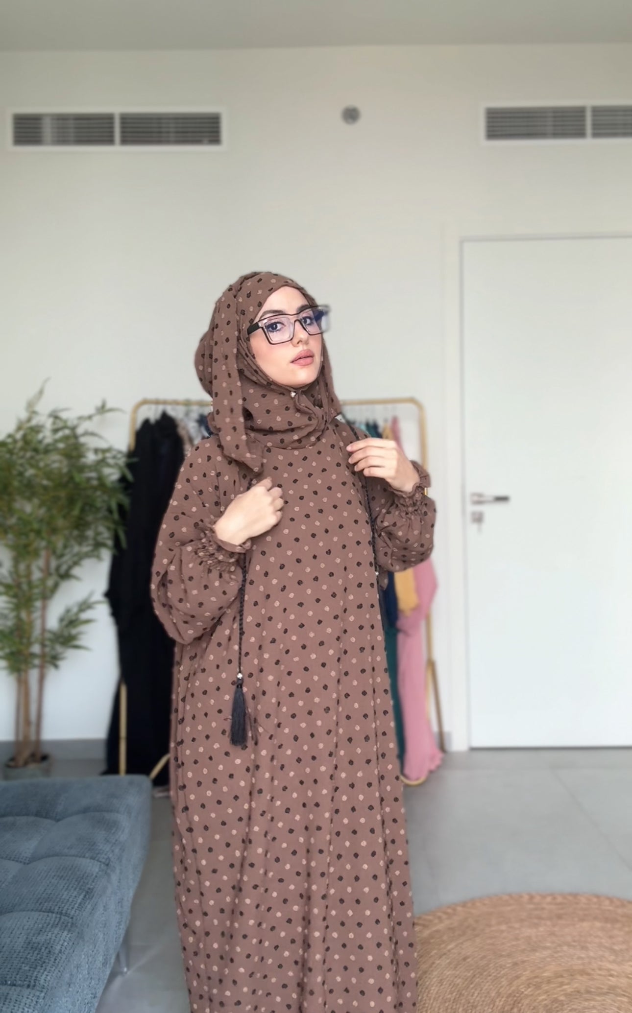 Brown burqa with black dots