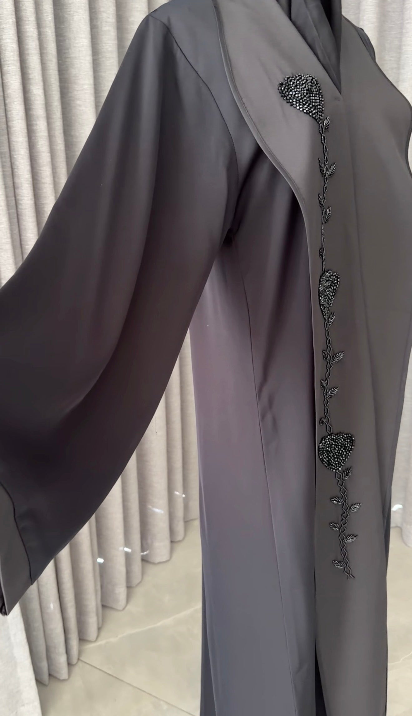 Black abayah with black beadwork detail