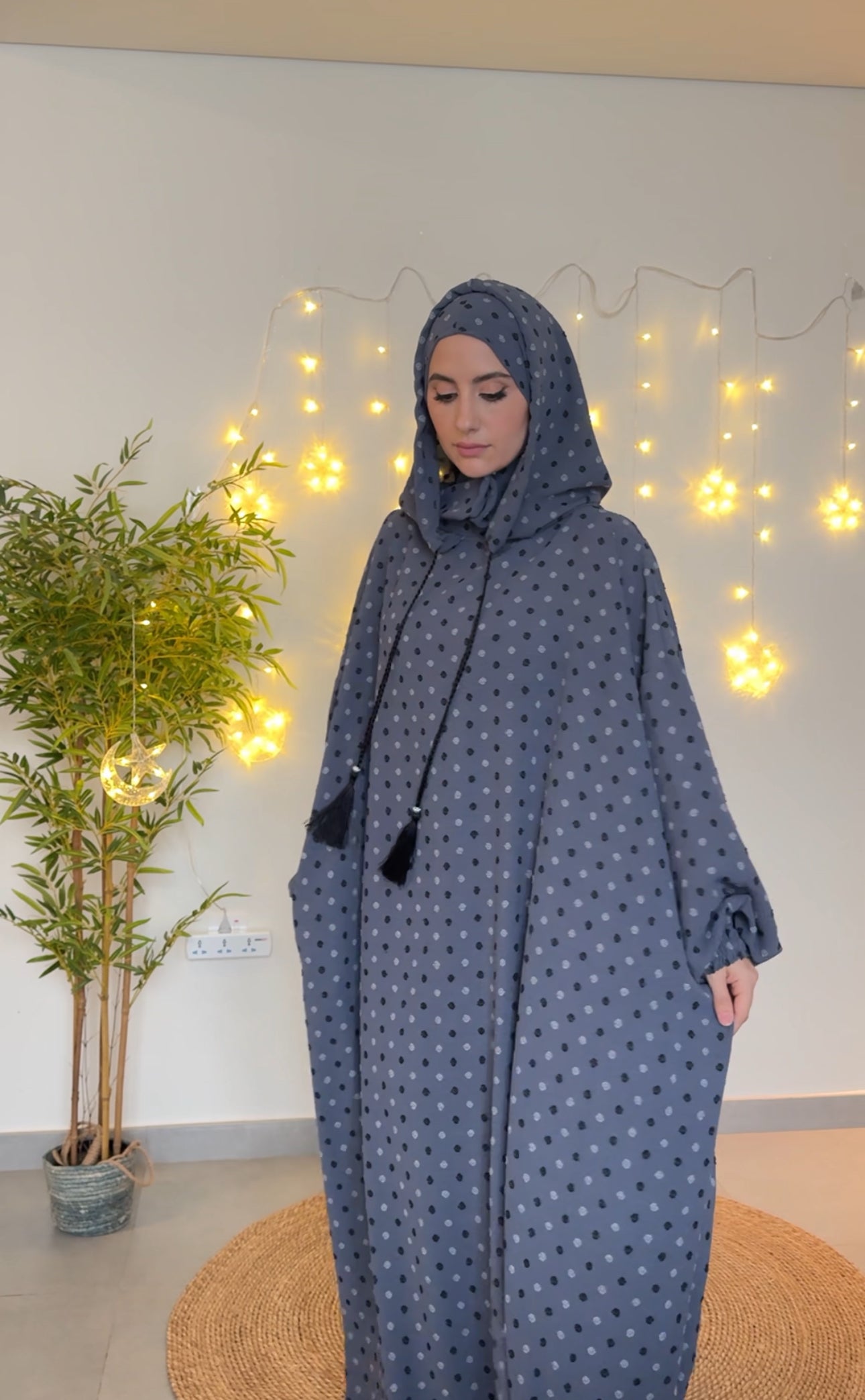 Gray burqa with black dots