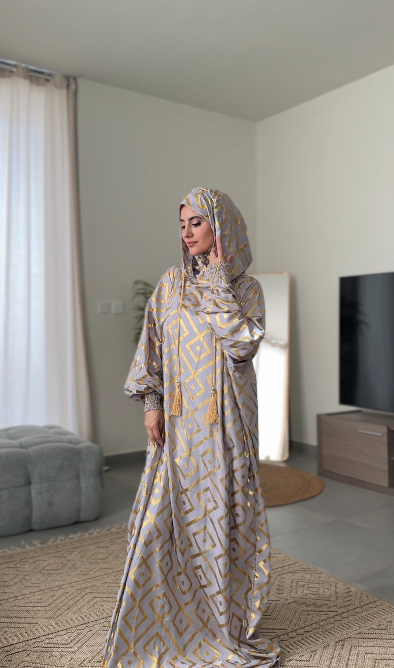 Light grey burqa with gold geometric lines