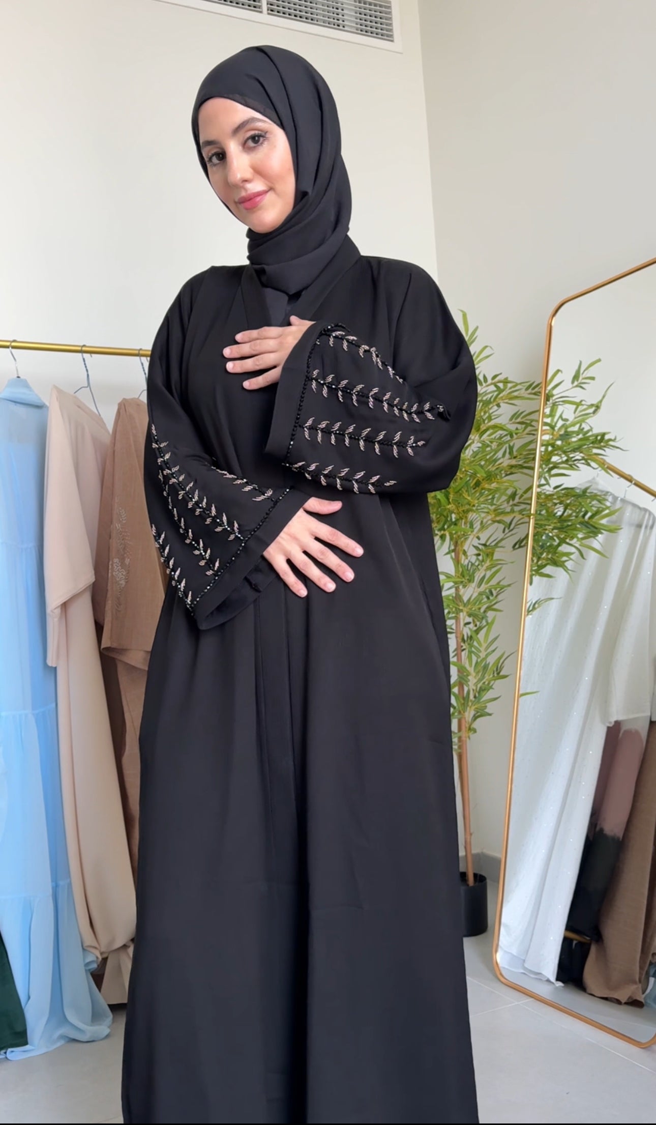 Black abayah with chrome leave work on sleeves