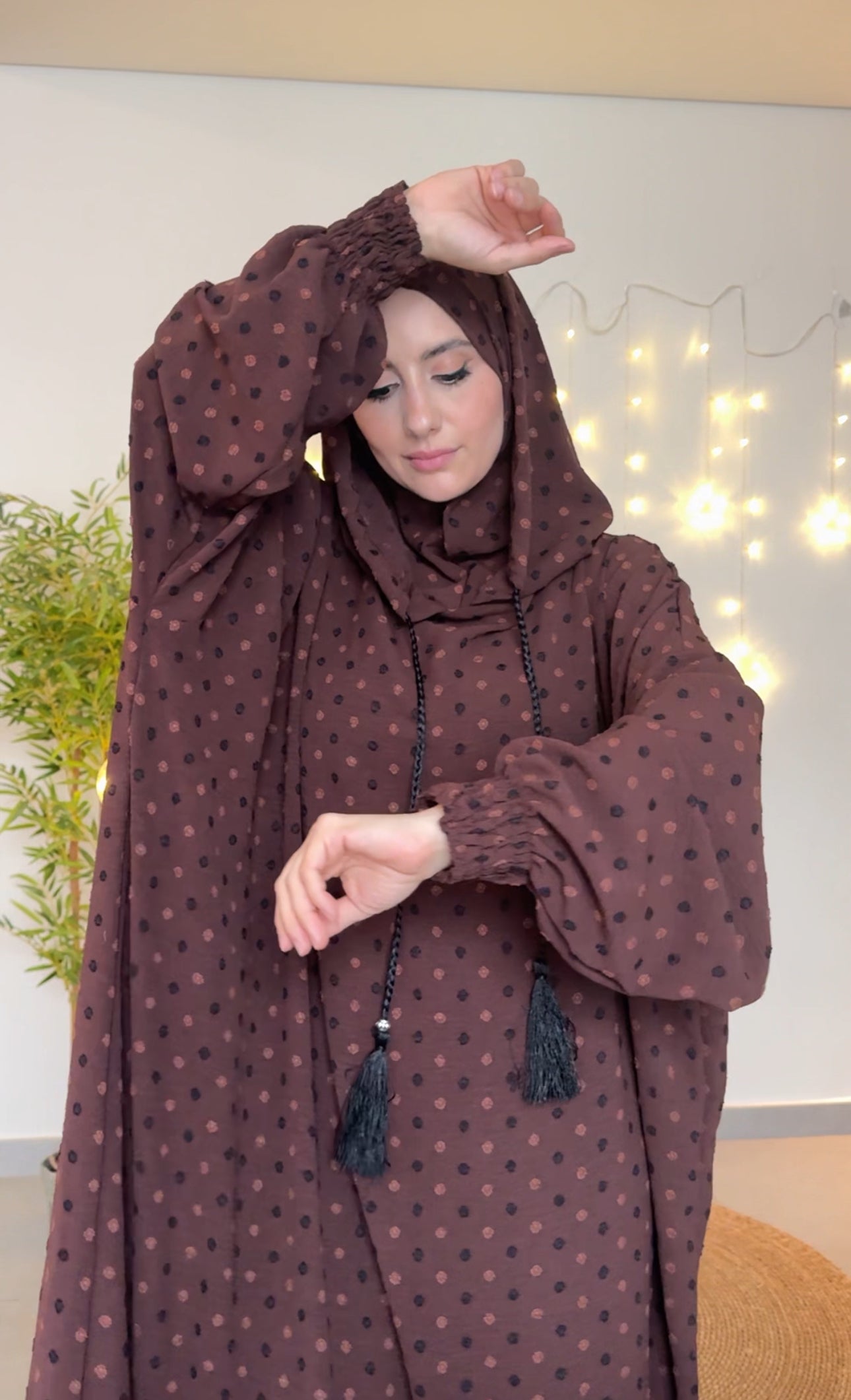 Dark brown burqa with black dots