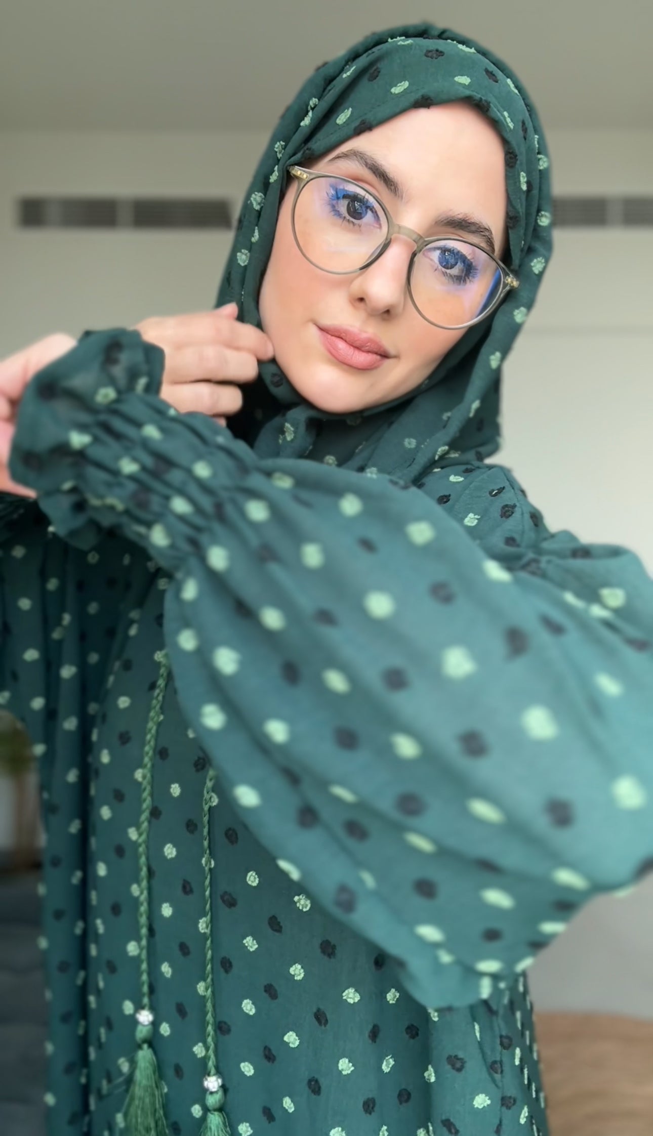 Emerald green burqa with black dots