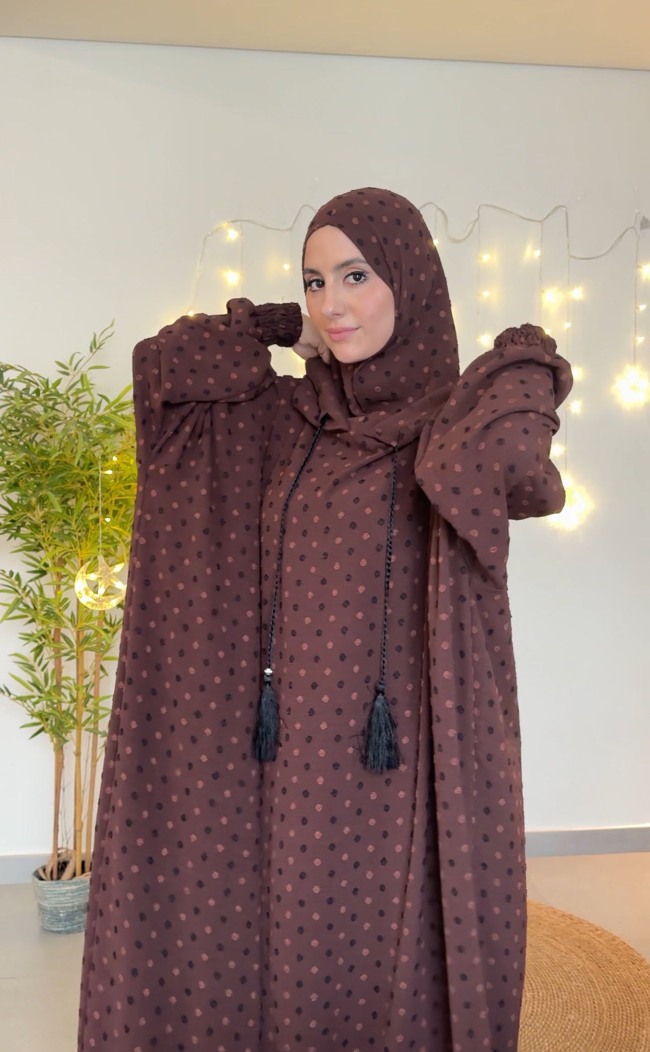 Dark brown burqa with black dots