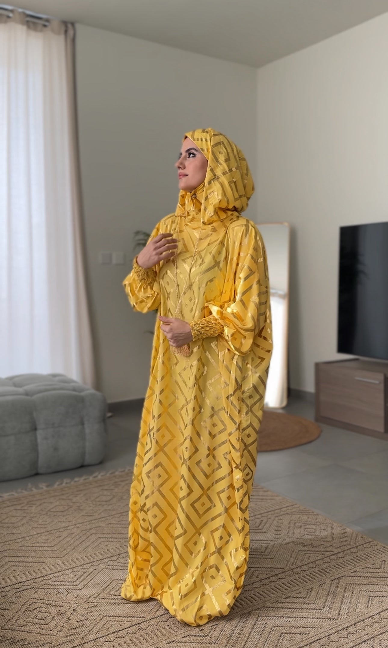 Yellow burqa with gold geometric lines