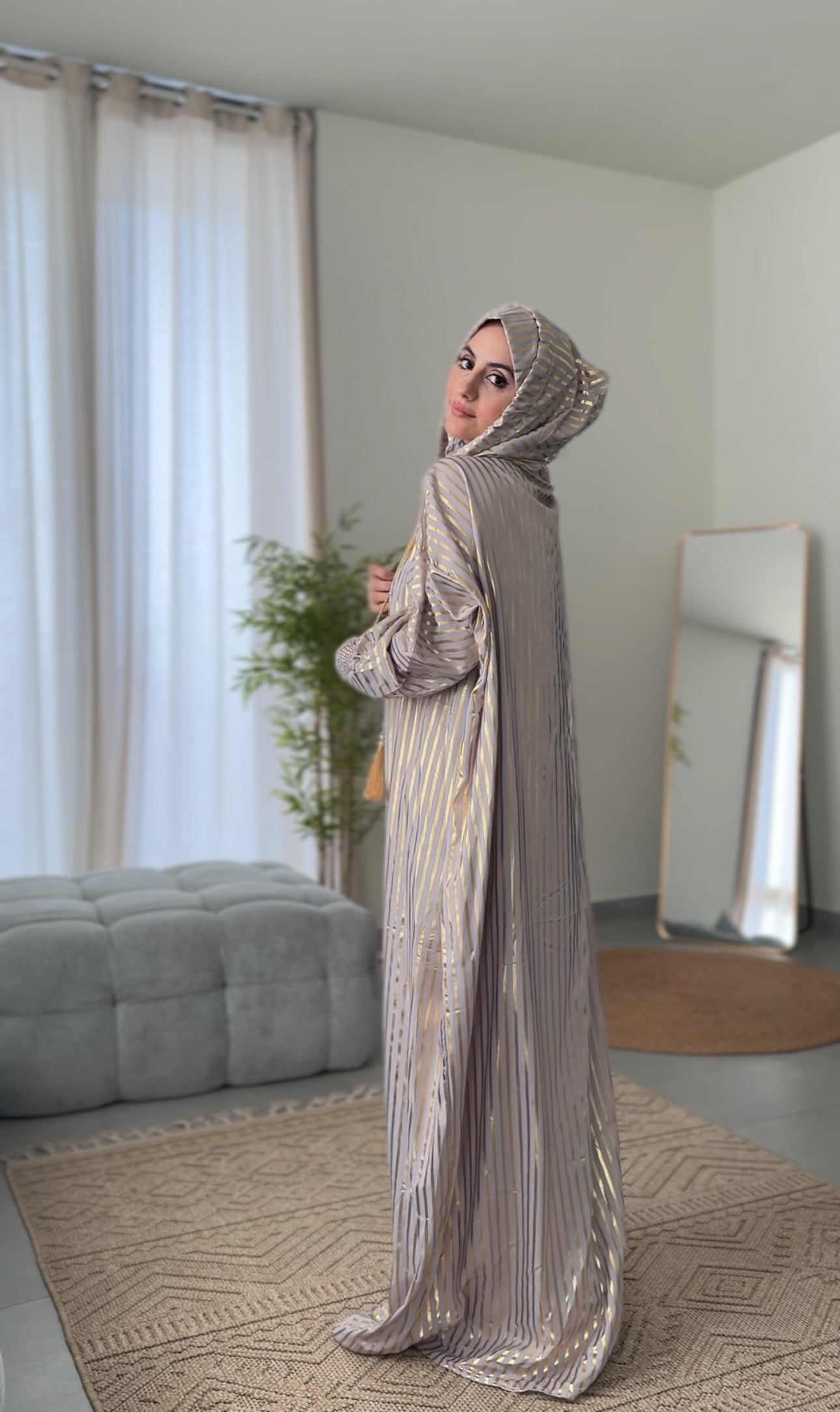 Light grey burqa with thick gold vertical lines