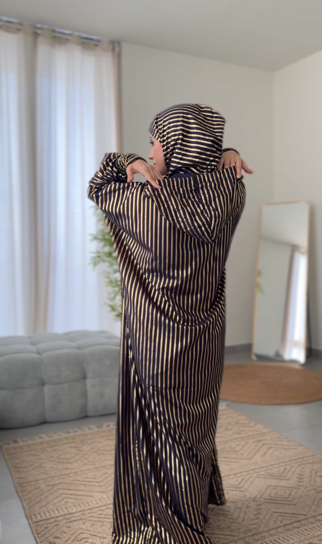 Dark navy burqa with thick gold vertical lines