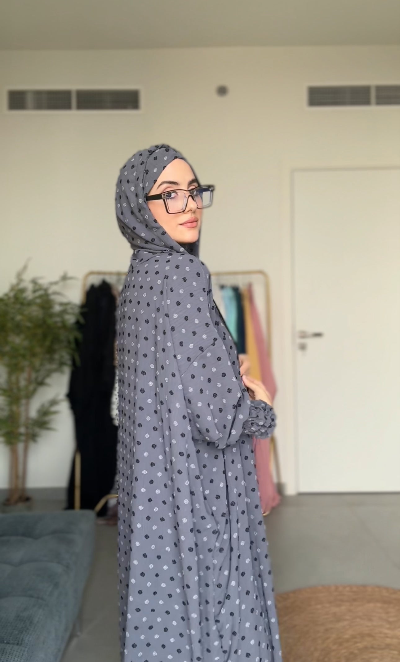 Gray burqa with black dots