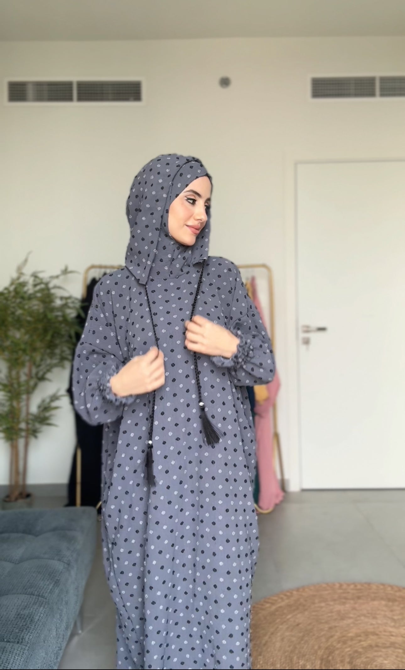 Gray burqa with black dots